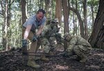 Eric Fanning, the 22nd Secretary of the Army, got some hands-on instruction on how the 25th Infantry Division's Lightning Academy prepares students for operations in a jungle environment, Aug. 7, 2016. 