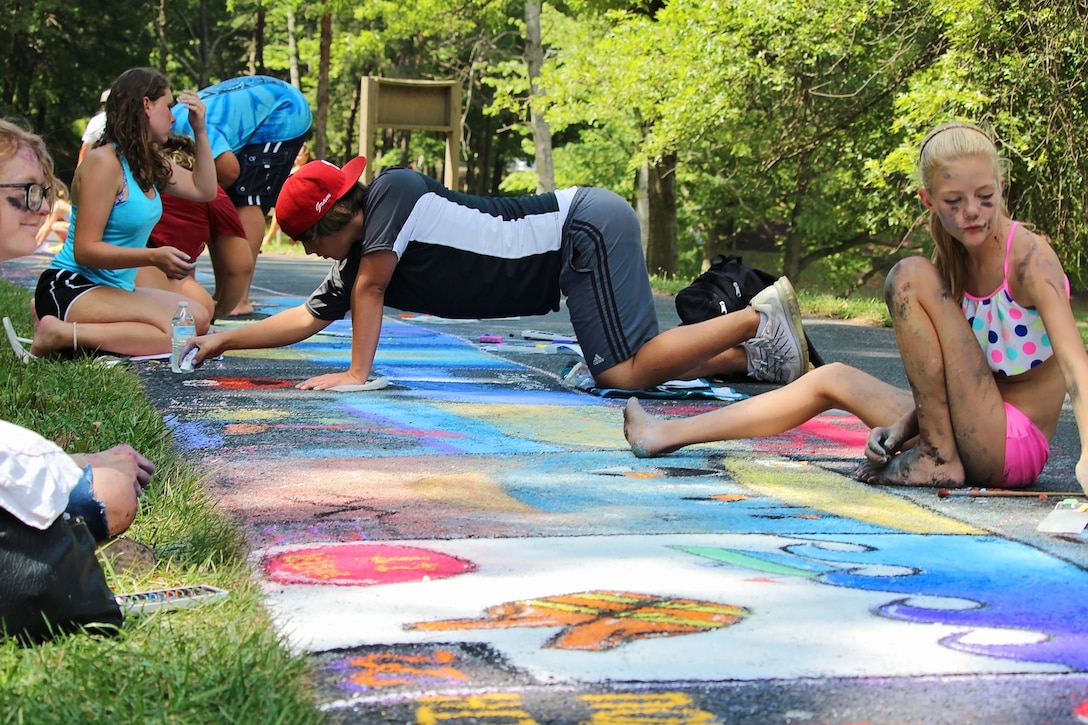 Children participate in the 5th annual “Chalk the Walk” art contest at Seven Points Beach on Saturday, Aug. 6, 2016. The U.S. Army Corps of Engineers event was free and open to public in an effort to communicate important messages regarding water safety and environmental stewardship in a fun, engaging way.

