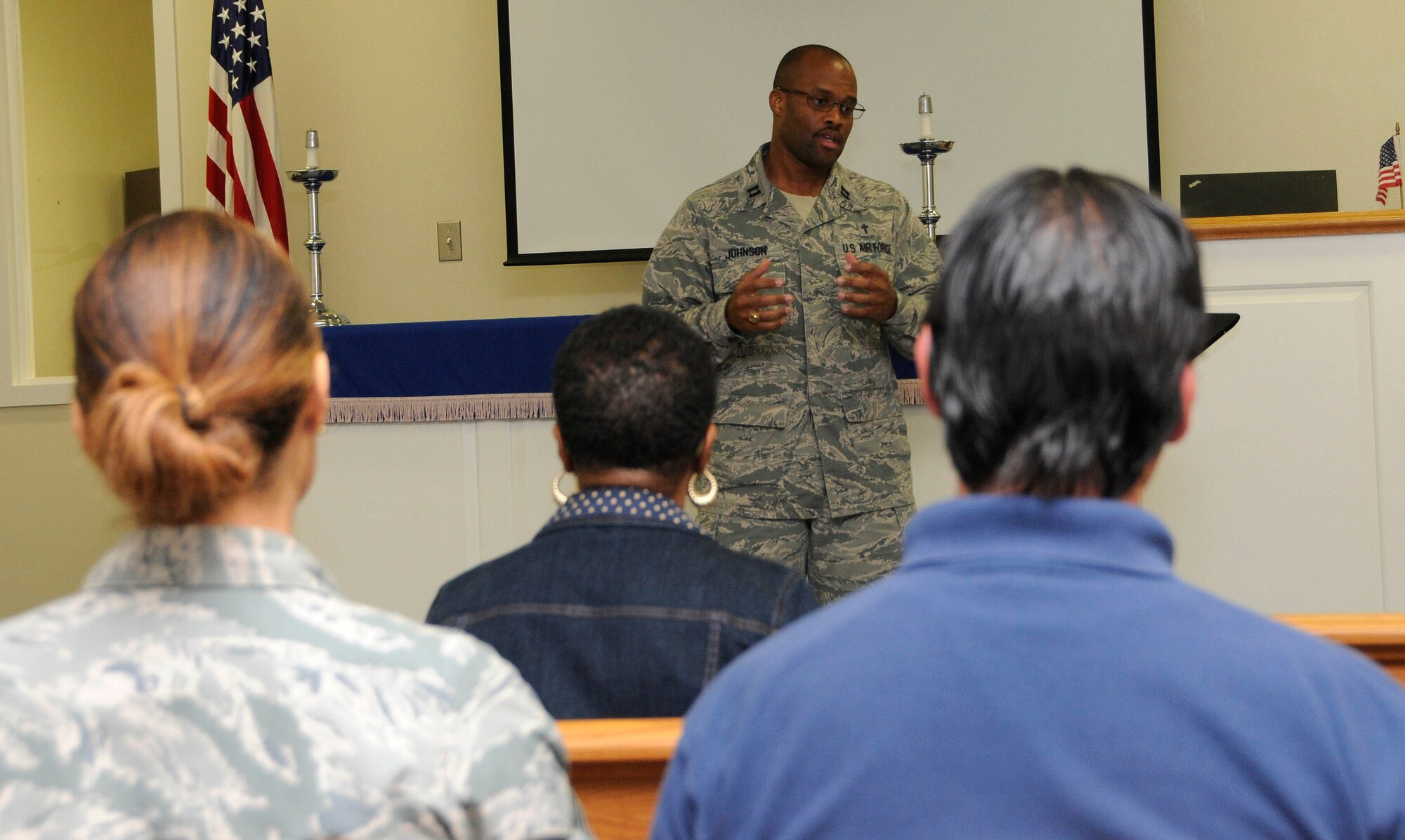 Chaplain (Capt.) Alex Johnson, a 482nd Fighter Wing chaplain, delivers a sermon at a worship service during the August Unit Training Assembly for the first time since 2014 at Homestead Air Reserve Base, Fla., Aug. 7. The chapel is offering nondenominational services every Sunday during UTAs at 10 a.m. (U.S. Air Force photo by Staff Sgt. Desiree W. Moye)