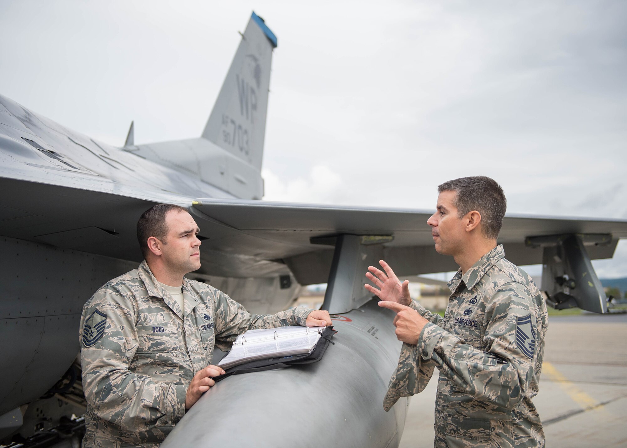 U.S. Air Force Senior Master Sgt. Michael Taylor, the Pacific Air Forces chaplain assistant functional manager, who is visiting Eielson Air Force Base, Alaska, during RED FLAG-Alaska (RF-A) 16-3, talks to a master sergeant Aug. 9, 2016. The command-level chaplain staff visited Eielson to observe the mission, get a feel for the climate of Airmen’s morale and see the purpose and operations tempo of RF-A, an exercise where units from across the Department of Defense and partner nations send to train for contingency operations in a controlled environment stressing joint and multinational integration. (U.S. Air Force photo by Staff Sgt. Shawn Nickel)