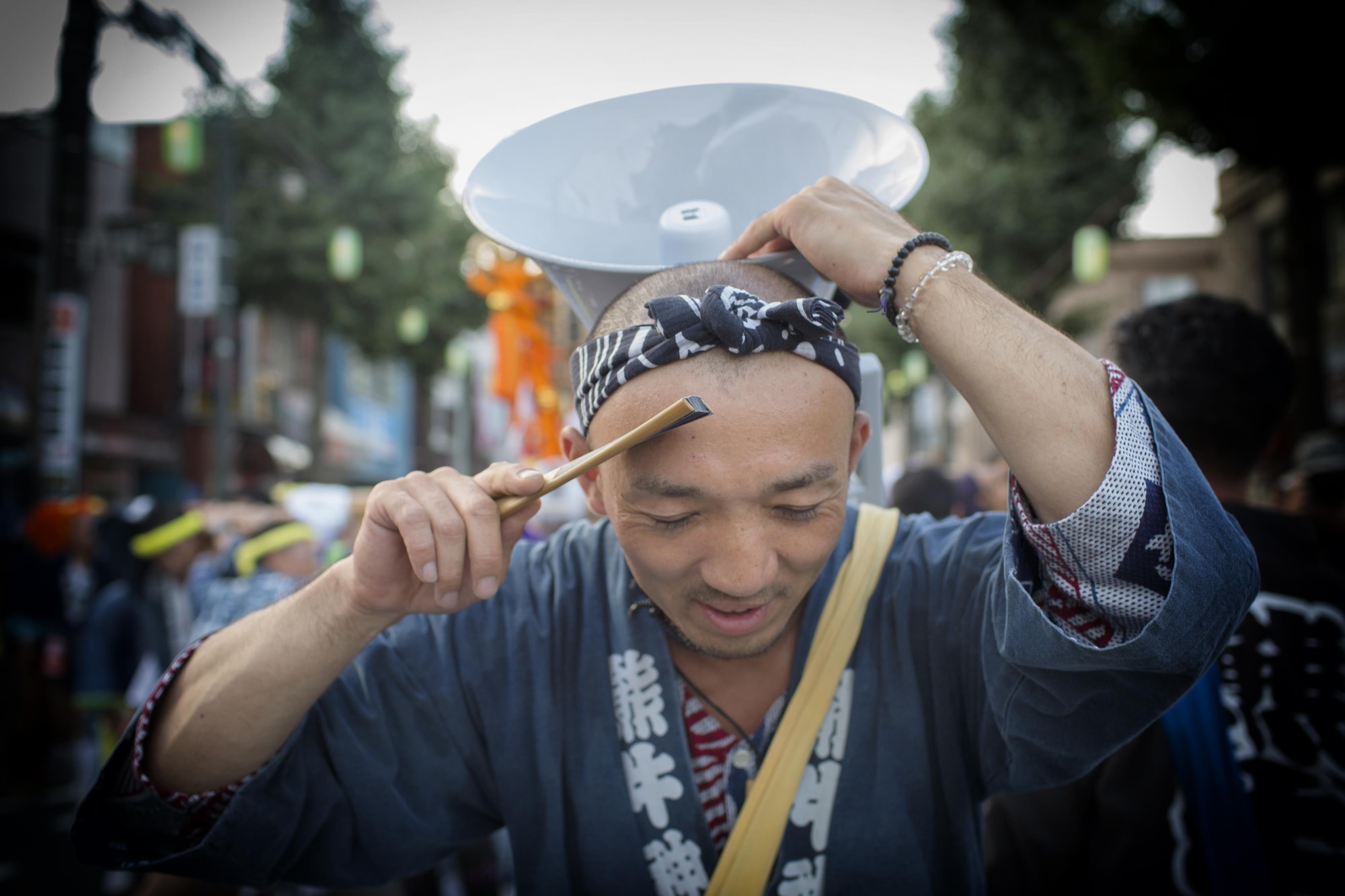 A festival attendee poses for a photo during the 66th annual Fussa Tanabata Festival in Fussa City, Japan, Aug. 5, 2016. The festival included several parades and street vendors selling a variety of traditional Japanese street foods. (U.S. Air Force photo by Yasuo Osakabe/Released)  