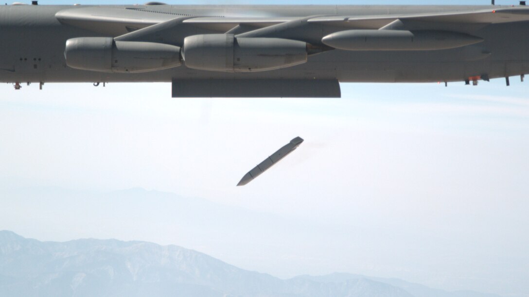A B-52 releases a Joint Attack Surface Standoff Missile from internal weapons bay at Edwards. This is the first time the JASSM has separated from the Conventional Rotary Launcher in the internal bay of the bomber. The test was the first phase of validation for the CLR. (U.S. Air Force image by Christian Turner)