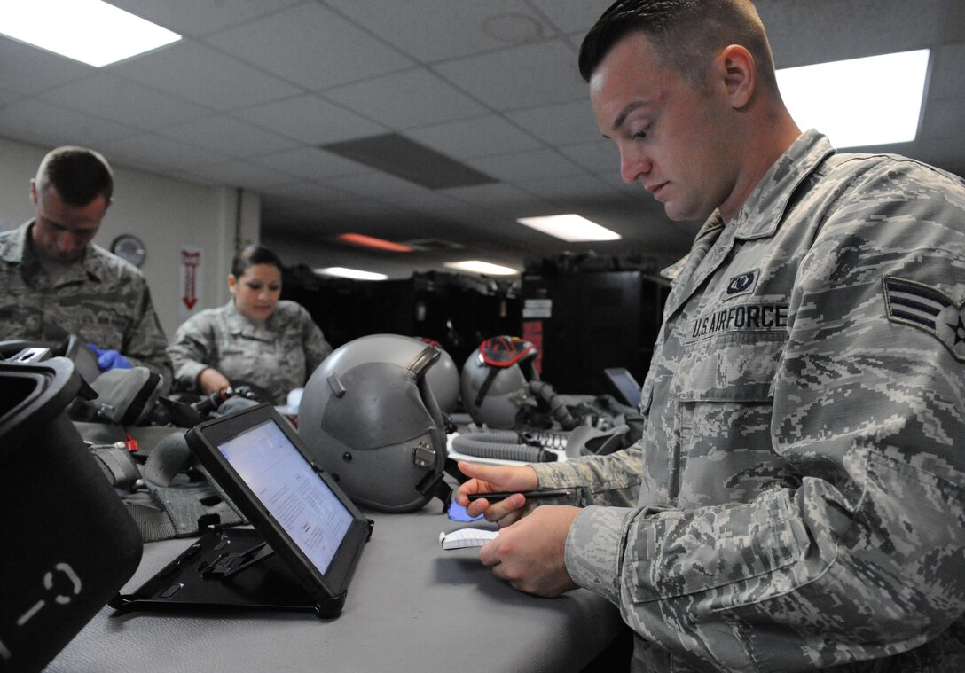 U.S. Air Force Senior Airman Brandon Perry, an Aircrew Flight Equipment technician, assigned to the 509th Operation Support Squadron, reviews technical orders at Andersen Air Force Base, Guam, Aug. 9, 2016. Each AFE member conducts the 134 item inspection ensuring there are no discrepancies before pilots don their gear. Members from Whiteman Air Force Base, Mo., along with three B-2s, deployed here in the Indo-Asia-Pacific to conduct U.S. Strategic Command-led air operations, providing leaders with deterrent options to maintain regional stability. (U.S. Air Force photo by Tech. Sgt. Miguel Lara III)