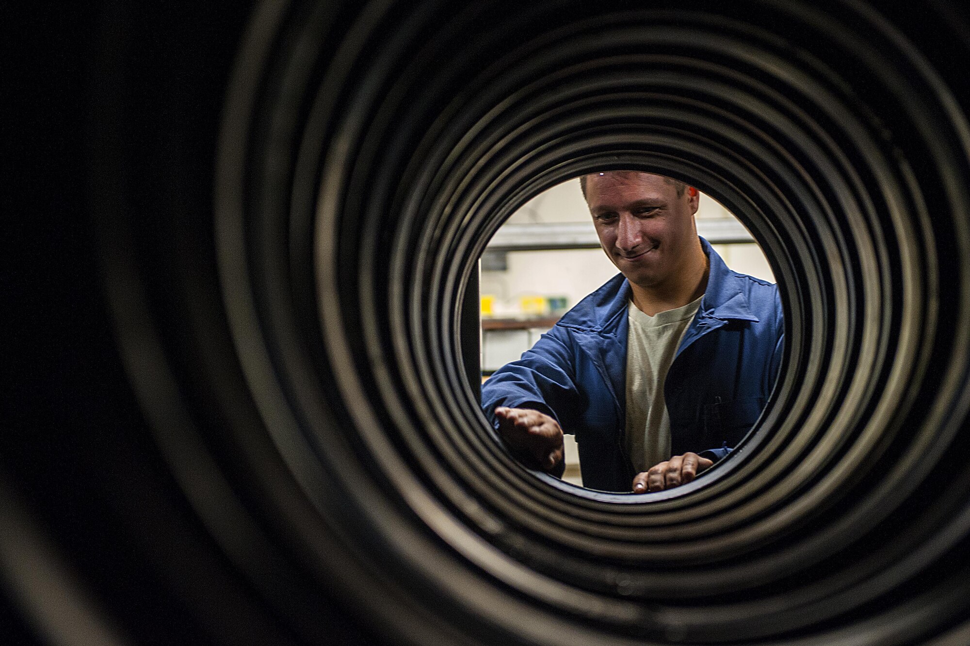 Senior Airman Christopher Tillman, 18th Equipment Maintenance Squadron wheel and tire technician, inspects a row of aircraft tires Aug. 10, 2016, at Kadena Air Base, Japan. The wheel and tire shop picks up old tires and drops off new ones to the different Aircraft Maintenance Units around the base. (U.S. Air Force photo by Airman 1st Class Corey M. Pettis)