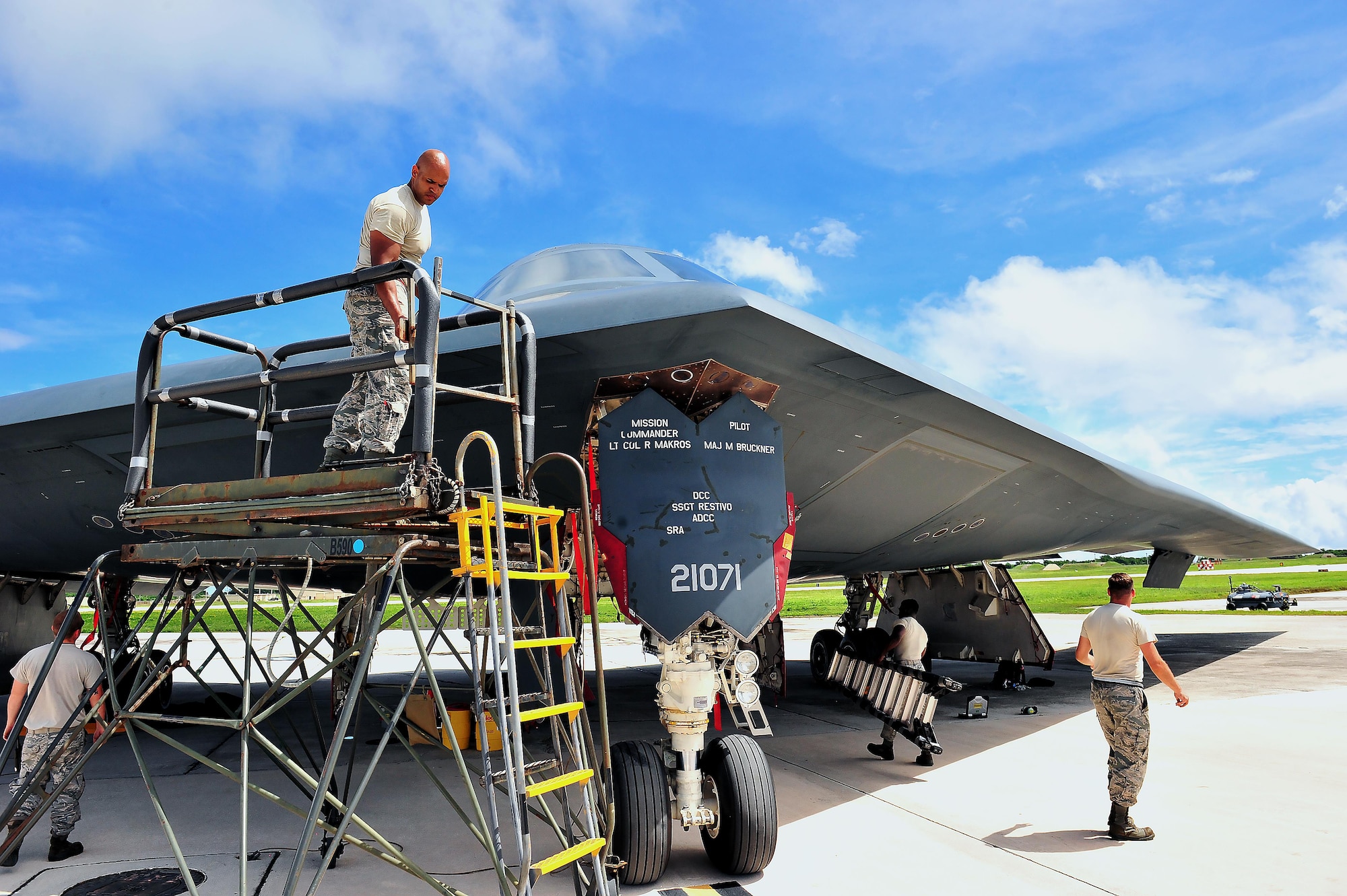 Members of the 509th and 131st Maintenance Group deployed from Whiteman Air Force Base, Mo., conduct pre-flight checks Aug. 10, 2016, at Andersen Air Force Base, Guam. Approximately 200 Airmen and three B-2 Spirits deployed here to demonstrate the ability of the U.S. bomber force providing a flexible and vigilant long range global-strike capability and a commitment to supporting global security. (U.S. Air Force photo by Senior Airman Jovan Banks)