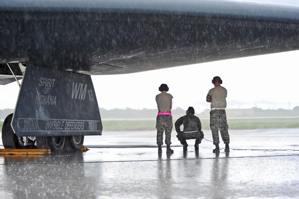 Airmen assigned to the 509th Aircraft Maintenance Squadron conduct pre-flight checks with a B-2 Spirit prior to take off at Andersen Air Force Base, Guam, Aug. 11, 2016. More than 200 Airmen and three B-2s deployed from Whiteman Air Force Base, Mo., in support of U.S. Strategic Command's Bomber Assurance and Deterrence missions. The BAAD deployments are part of a long-standing history of maintaining a consistent bomber presence in the Indo-Asia-Pacific in order to maintain regional stability, and provide assurance to our allies and partners in the region. ( U.S. Air Force photo by Tech. Sgt. Miguel Lara III)