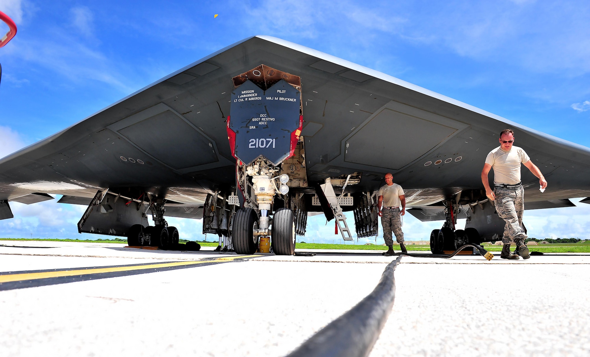 U.S. Air Force Senior Airman Julian Tobin (left), an aerospace repair technician assigned to the 509th Maintenance Squadron, and Tech. Sgt. Kory Stanton, a dedicated crew chief assigned to the 509th Aircraft Maintenance Squadron, finish pre-flight inspections Aug. 10, 2016 at Andersen Air Force Base, Guam. Bomber training missions ensure crews maintain a high state of readiness and proficiency in demonstrating their ability to provide an always-ready global strike capability. (U.S. Air Force photo by Senior Airman Jovan Banks)