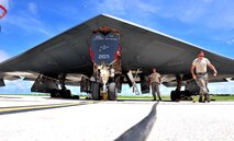 U.S. Air Force Senior Airman Julian Tobin (left), an aerospace repair technician assigned to the 509th Maintenance Squadron, and Tech. Sgt. Kory Stanton, a dedicated crew chief assigned to the 509th Aircraft Maintenance Squadron, finish pre-flight inspections Aug. 10, 2016 at Andersen Air Force Base, Guam. Bomber training missions ensure crews maintain a high state of readiness and proficiency in demonstrating their ability to provide an always-ready global strike capability. (U.S. Air Force photo by Senior Airman Jovan Banks)