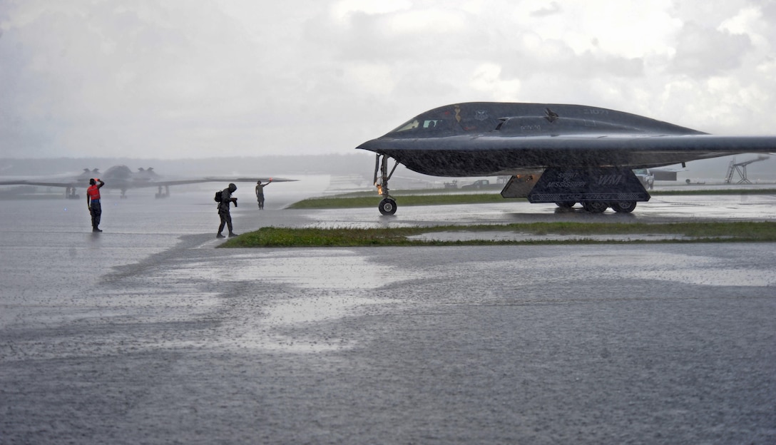 U.S. Air Force B-2 Spirits deployed from Whiteman Air Force Base, Mo., taxi toward the flightline prior to take off at Andersen Air Force Base, Guam, Aug. 11, 2016. Bomber crews readily deploy in the Indo-Asia-Pacific region to conduct global operations in coordination with other Combatant Commands, Services, and appropriate U.S. Government Agencies to deter and detect strategic attacks against the U.S., its allies and partners. (U.S. Air Force photo by Tech. Sgt. Miguel Lara III)
