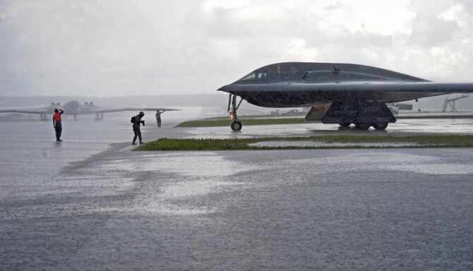 U.S. Air Force B-2 Spirits deployed from Whiteman Air Force Base, Mo., taxi toward the flightline prior to take off at Andersen Air Force Base, Guam, Aug. 11, 2016. Bomber crews readily deploy in the Indo-Asia-Pacific region to conduct global operations in coordination with other Combatant Commands, Services, and appropriate U.S. Government Agencies to deter and detect strategic attacks against the U.S., its allies and partners. (U.S. Air Force photo by Tech. Sgt. Miguel Lara III)