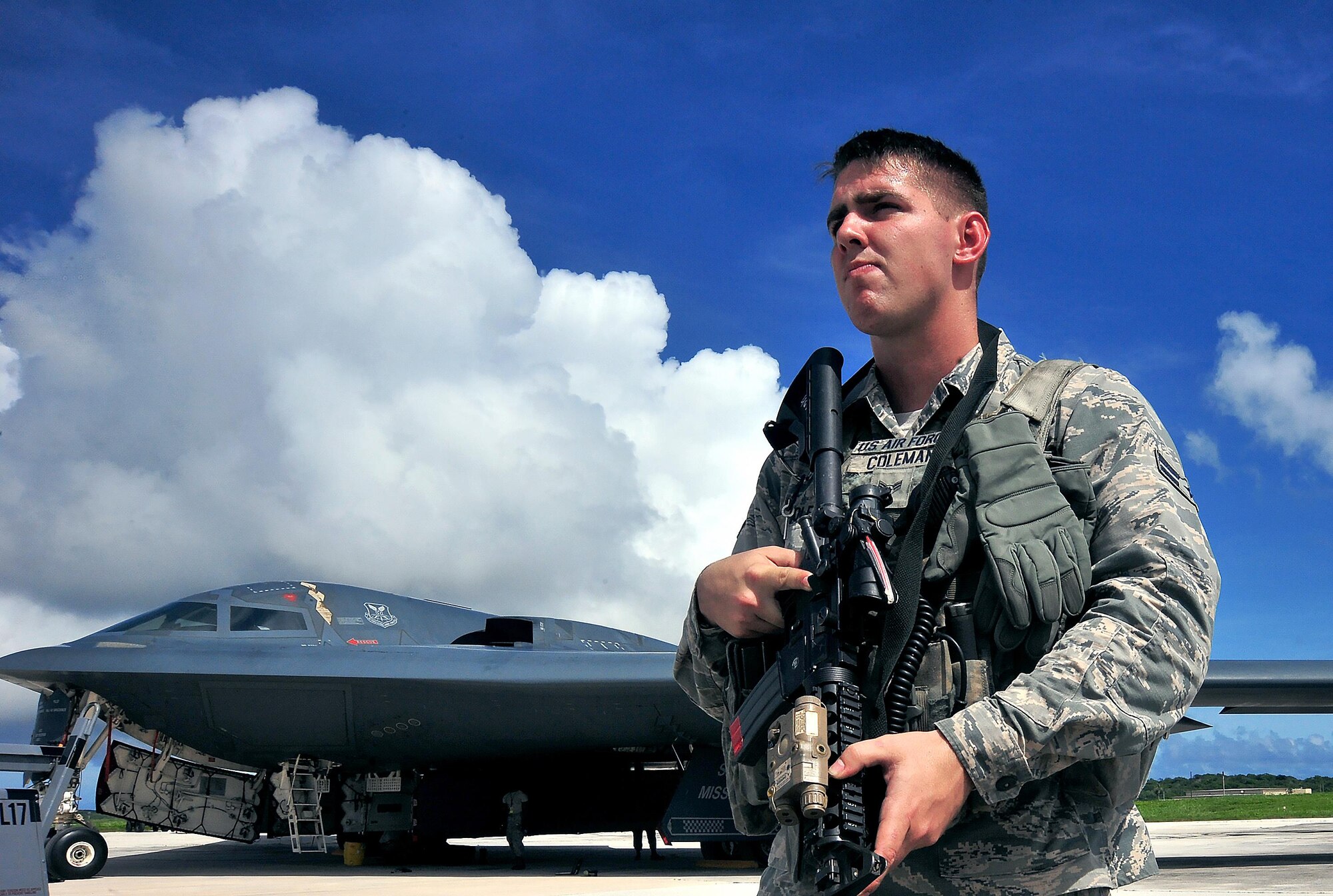 U.S. Air Force Airman 1st Class Chase Coleman, an entry controller with the 509th Security Forces Squadron from Whiteman Air Force Base, Mo., stands guards at an entry control point Aug. 10, 2016 at Andersen Air Force Base, Guam. The United States maintains a strong, credible bomber force that enhances the security and stability of allies and partners around the globe. (U.S. Air Force photo by Senior Airman Jovan Banks)