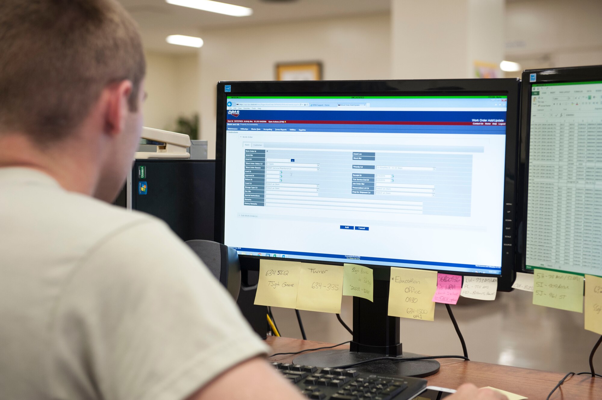 Airman 1st Class Billy Stephens, 18th Logistics Readiness Squadron fleet management and analysis apprentice, reviews vehicle data in the defense property accountability system Aug. 11, 2016, at Kadena Air Base, Japan. The DPAS allows FMA Airmen to save time by uploading data to an online database from which authorized personnel anywhere on the globe may access, instead having to file individual requests through emails. (U.S. Air Force photo by Senior Airman Peter Reft)