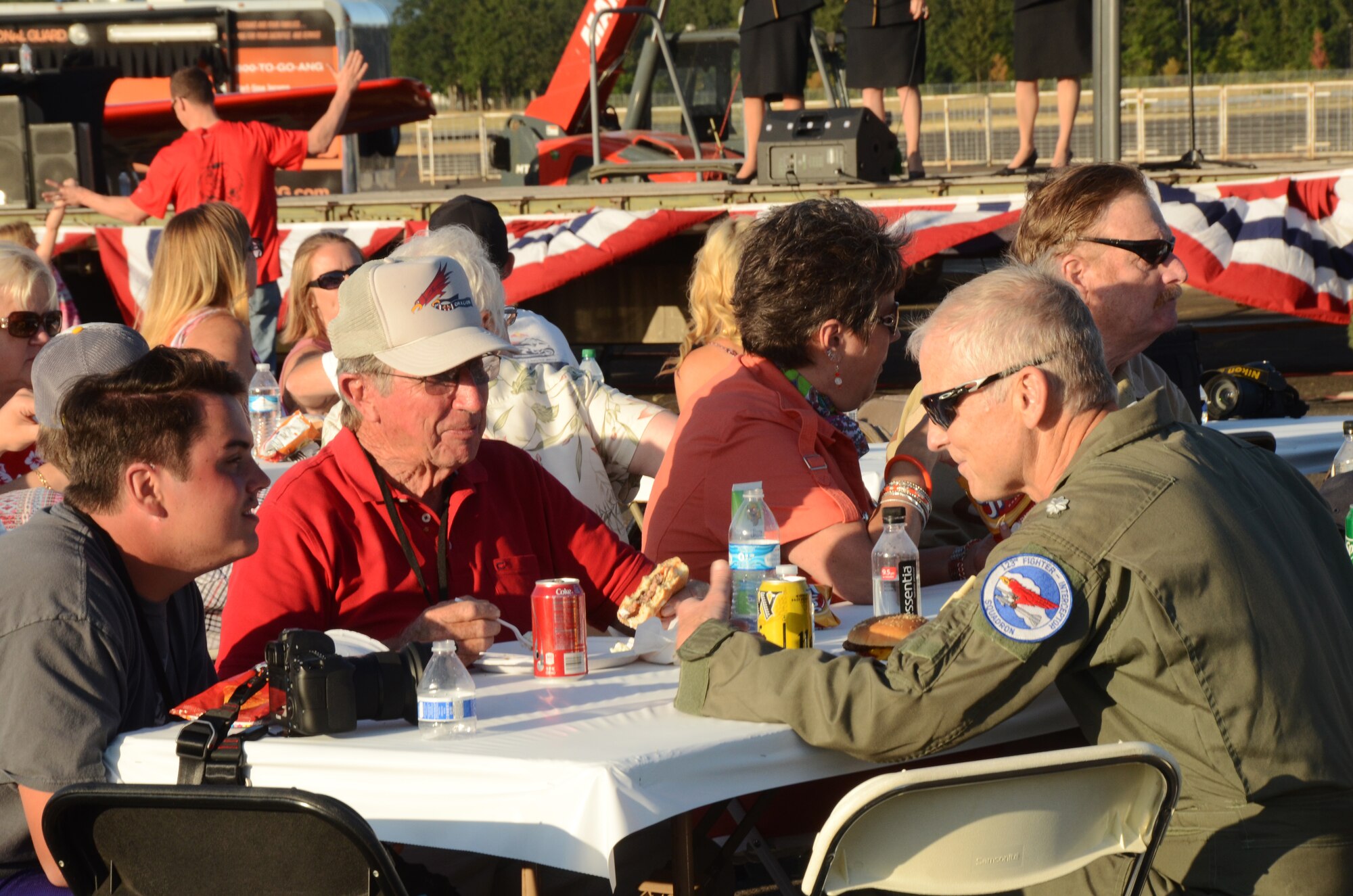 Current and retired members of the Oregon Air National Guard gather for an afterhours “All Call” celebration as part of the 75th Anniversary of the Oregon Air National Guard during the Oregon International Air Show, Hillsboro, Ore., Aug. 6, 2016. (U.S. Air National Guard photo by Tech. Sgt. John Hughel, 142nd Fighter Wing Public Affairs/Released).