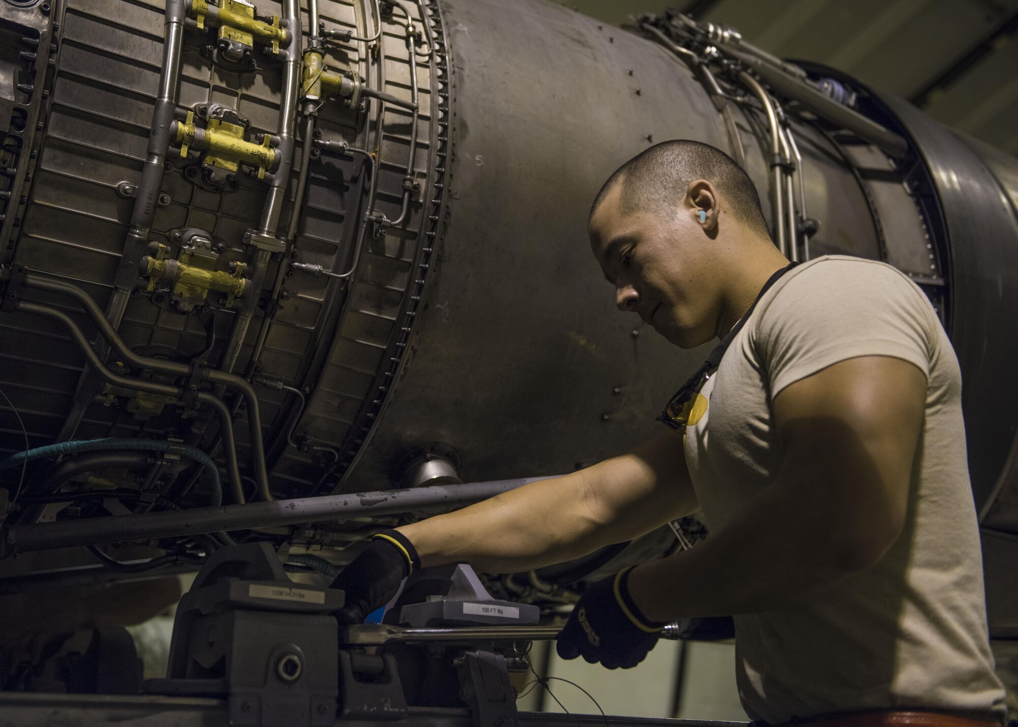 Staff Sgt. Jose Barsallo, 455th Expeditionary Aircraft Maintenance Squadron F-16C Fighting Falcon crew chief, installs an engine on an F-16C Fighting Falcon, Bagram Airfield, Afghanistan, Aug. 9, 2016.  Crew chiefs are responsible for diagnosing aircraft malfunctions and replacing components. They ensure the aircraft is mission ready. (U.S. Air Force photo by Senior Airman Justyn M. Freeman)