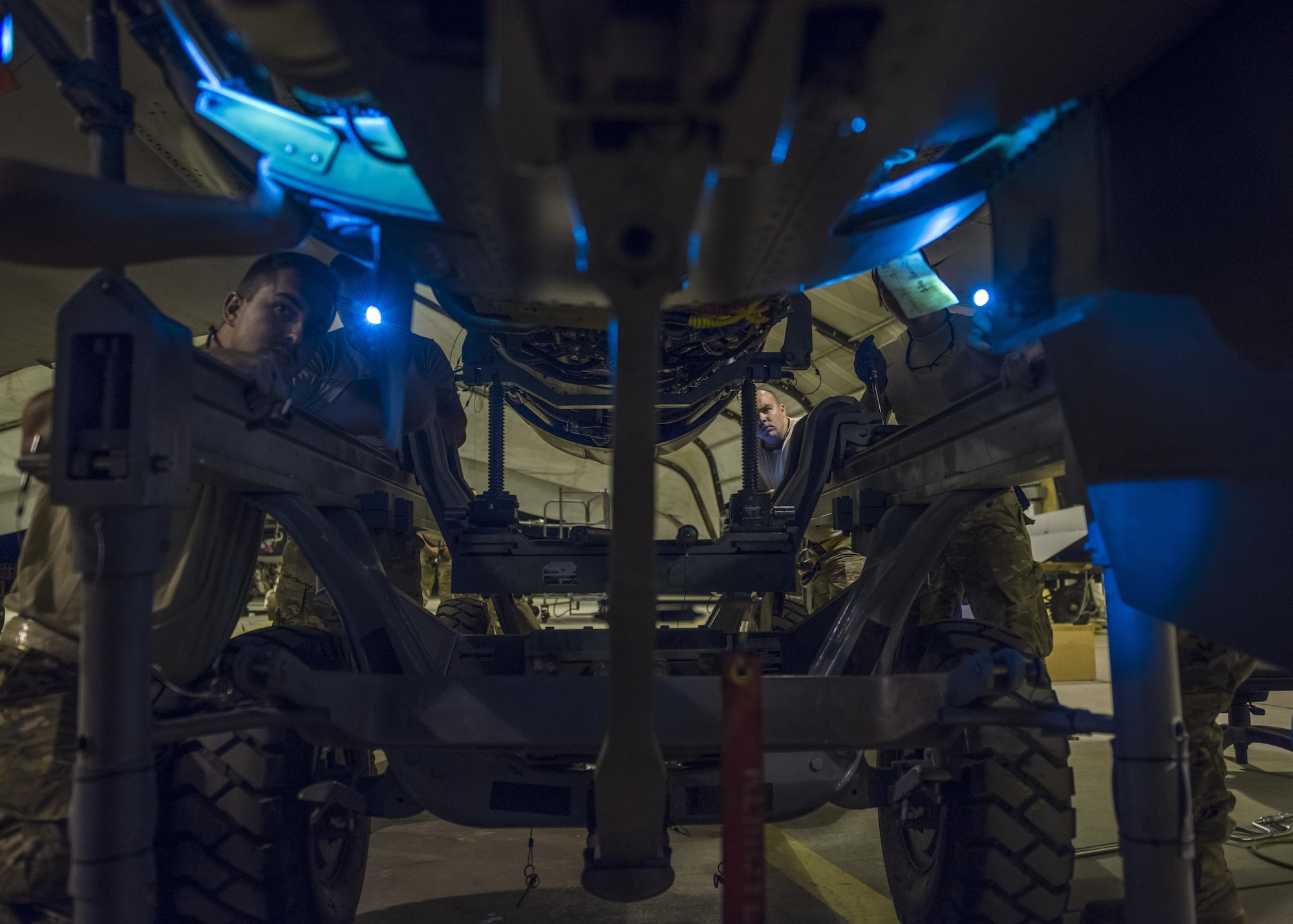 455th Expeditionary Aircraft Maintenance Squadron tactical aircraft maintenance technicians otherwise known as crew chiefs, install an F-16C Fighting Falcon engine, Bagram Airfield, Afghanistan, Aug. 9, 2016. Crew Chiefs conduct day-to-day maintenance, including end-of-runway, postflight, preflight, thru-flight, special inspections and phase inspections. They are also responsible for diagnosing aircraft malfunctions and replacing components. (U.S. Air Force photo by Senior Airman Justyn M. Freeman)