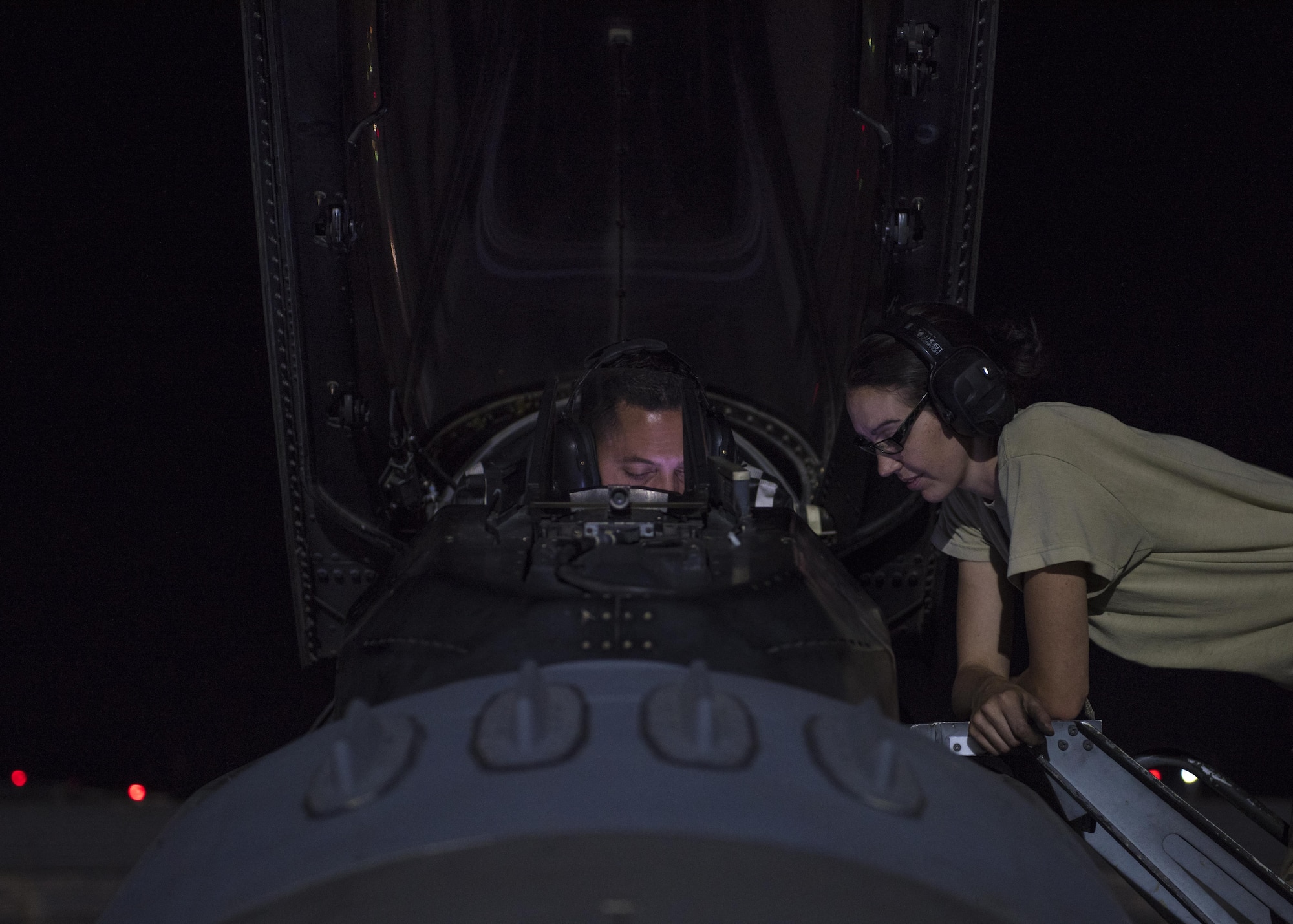 Tech. Sgt. Kaisha Gurtner and Tech. Sgt. Joshua Tocci, 455th Expeditionary Aircraft Maintenance Squadron weapons armament systems technicians, perform a weapons check on an F-16C Fighting Falcon, Bagram Airfield, Afghanistan, Aug. 9, 2016. Weapons system technicians conduct testing and evaluations of new weapons systems and load aircraft ordnance. They are also responsible for maintaining launch and release devices on aircraft. (U.S. Air Force photo by Senior Airman Justyn M. Freeman)