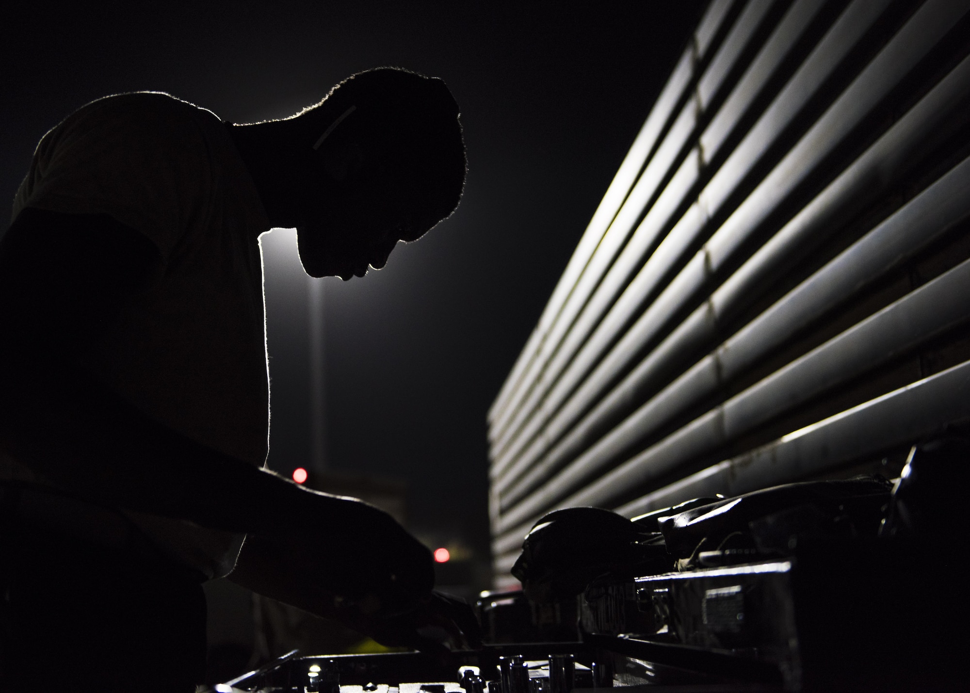 Senior Airman Jamie Miller, 455th Expeditionary Aircraft Maintenance Squadron weapons armament systems technician, gathers tools to perform a function check on an F-16C Fighting Falcon, Bagram Airfield, Afghanistan, Aug. 9, 2016. Function checks and scheduled maintenance is conducted to ensure weapon devices can be accurately delivered from aircraft. (U.S. Air Force photo by Senior Airman Justyn M. Freeman)