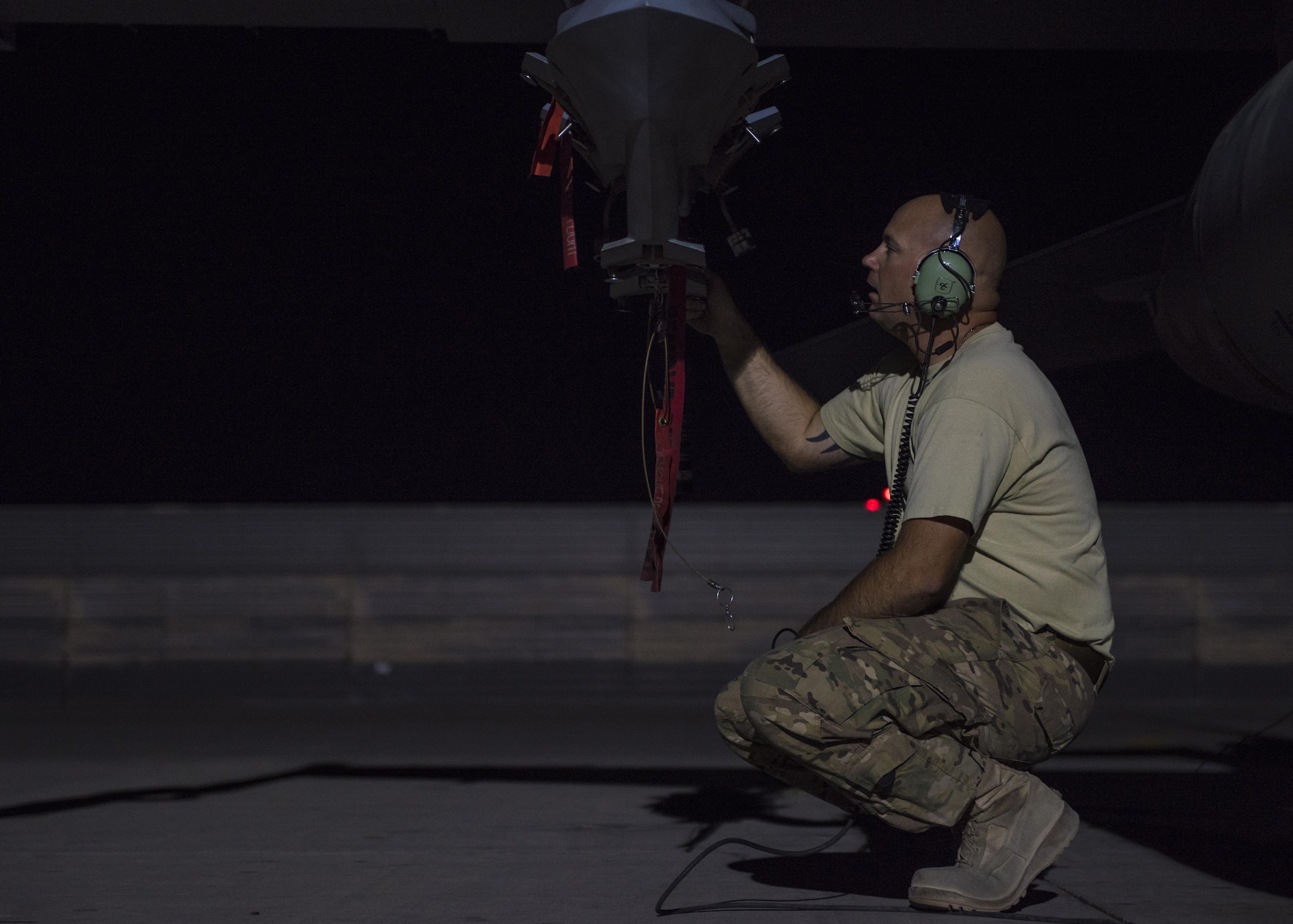 Master Sgt. Donnie Miller, 455th Expeditionary Aircraft Maintenance Squadron weapons armament systems technician, completes an ejector rack function check, Bagram Airfield, Afghanistan, Aug. 9, 2016. Triple ejector racks are used to house weapon devices on the F-16C Fighting Falcon. Weapons system technician are responsible for maintaining launch and release devices and ensure explosive devices can be accurately delivered from aircraft. (U.S. Air Force photo by Senior Airman Justyn M. Freeman)