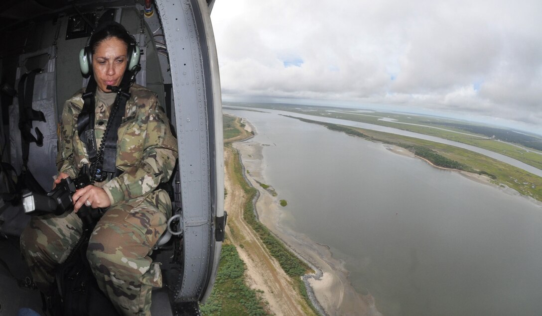 Lt. Col. Reneé Russo-Johnson, an Army public affairs officer, observes the outer harbor and shipping channel in Savannah, Georgia, Aug. 11, 2016. Russo-Johnson was part of team accompanying Under Secretary of the Army Patrick Murphy. The Savannah District of the U.S. Army Corps of Engineers maintains the Savannah harbor and is currently deepening it an additional 5 feet to accommodate larger, post-Panamax container vessels.