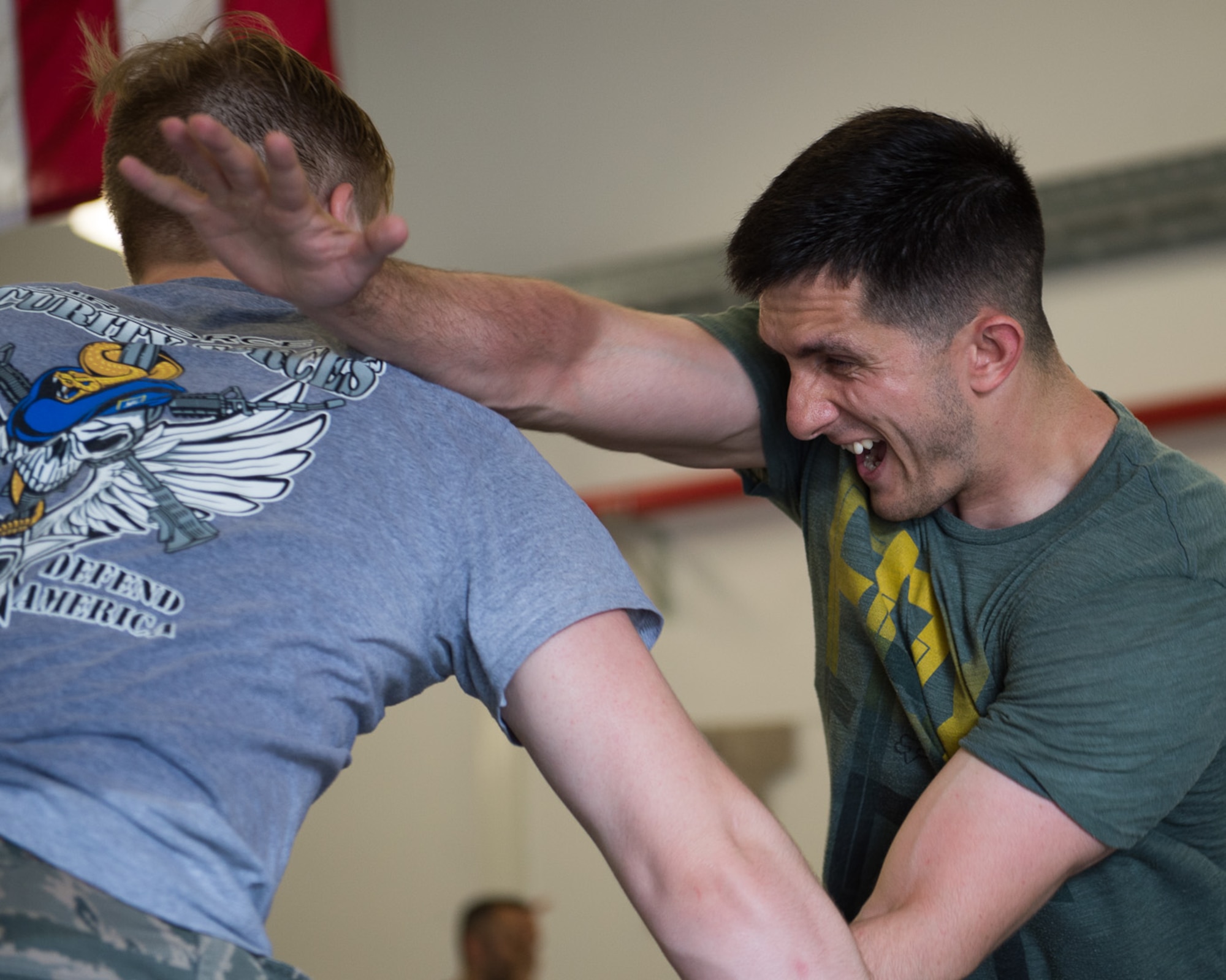 U.S. Air Force Staff Sgt. Justin Hains, 435 Security Forces Squadron ground regional training center instructor, disarms his partner August 5, 2016, at Ramstein Air Base, Germany. (U.S. Air Force photo/Airman 1st Class Savannah L. Waters)

