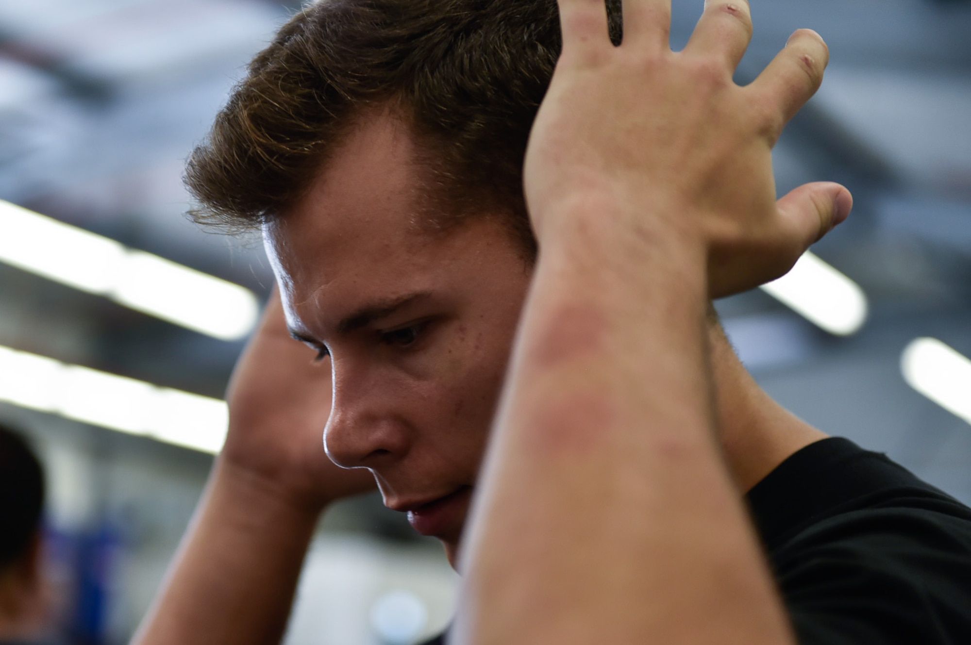 U.S. Air Force Staff Sgt. Jeffery Derrick, 786 Civil Engineer Squadron explosive ordnance disposal team leader, braces for impact during a self-defense course August 5, 2016, at Ramstein Air Base, Germany. The 435 Security Forces Squadron coordinated the training and this is the third year they’ve organized the event. (U.S. Air Force photo/Airman 1st Class Savannah L. Waters)