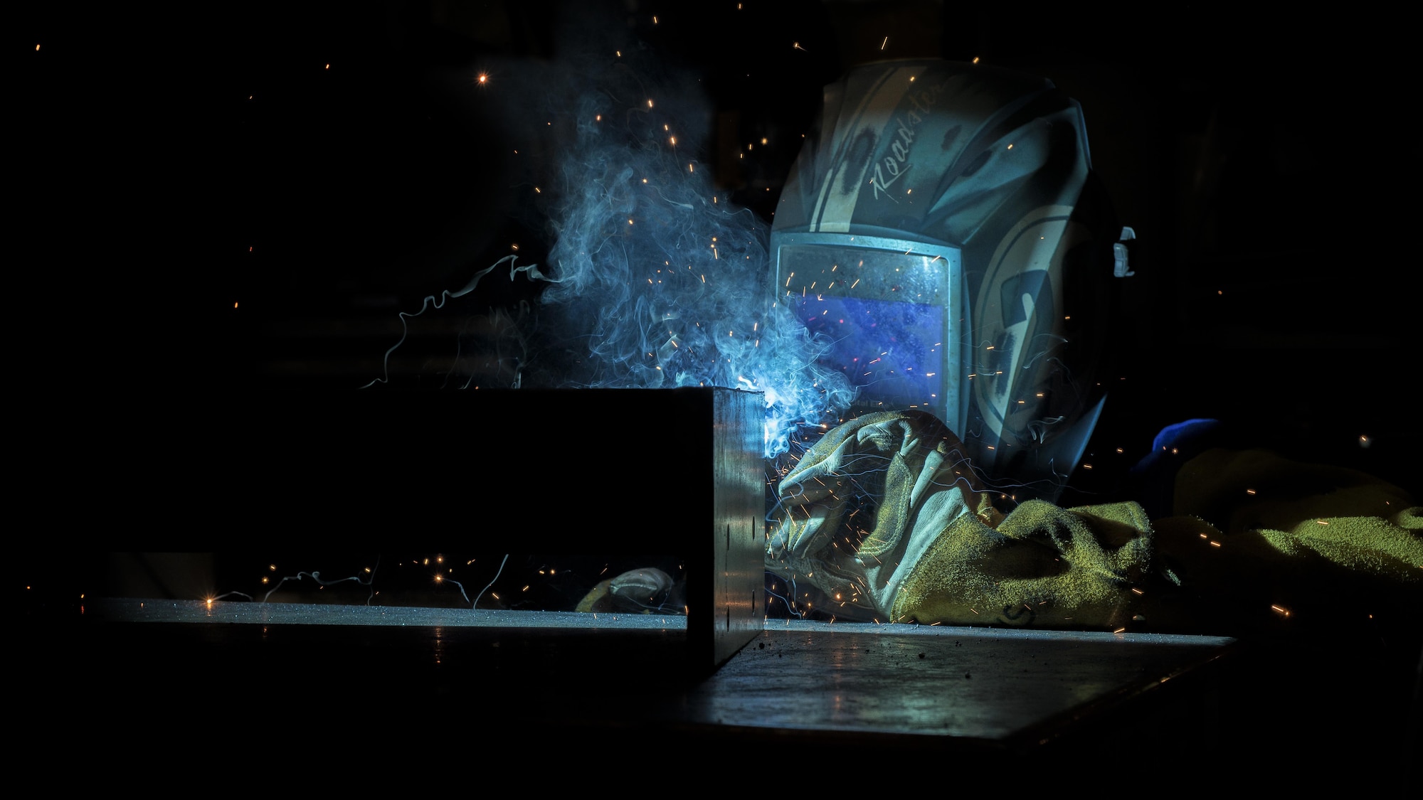 Senior Airman Jeffrey Jenkins, a 31st Maintenance Squadron metals technology craftsman, welds a bracket Aug. 2, 2016, at Aviano Air Base, Italy. Once completed, the brackets will hold radars for the 606th Air Control Squadron. (U.S. Air Force photo/Airman 1st Class Cory W. Bush)