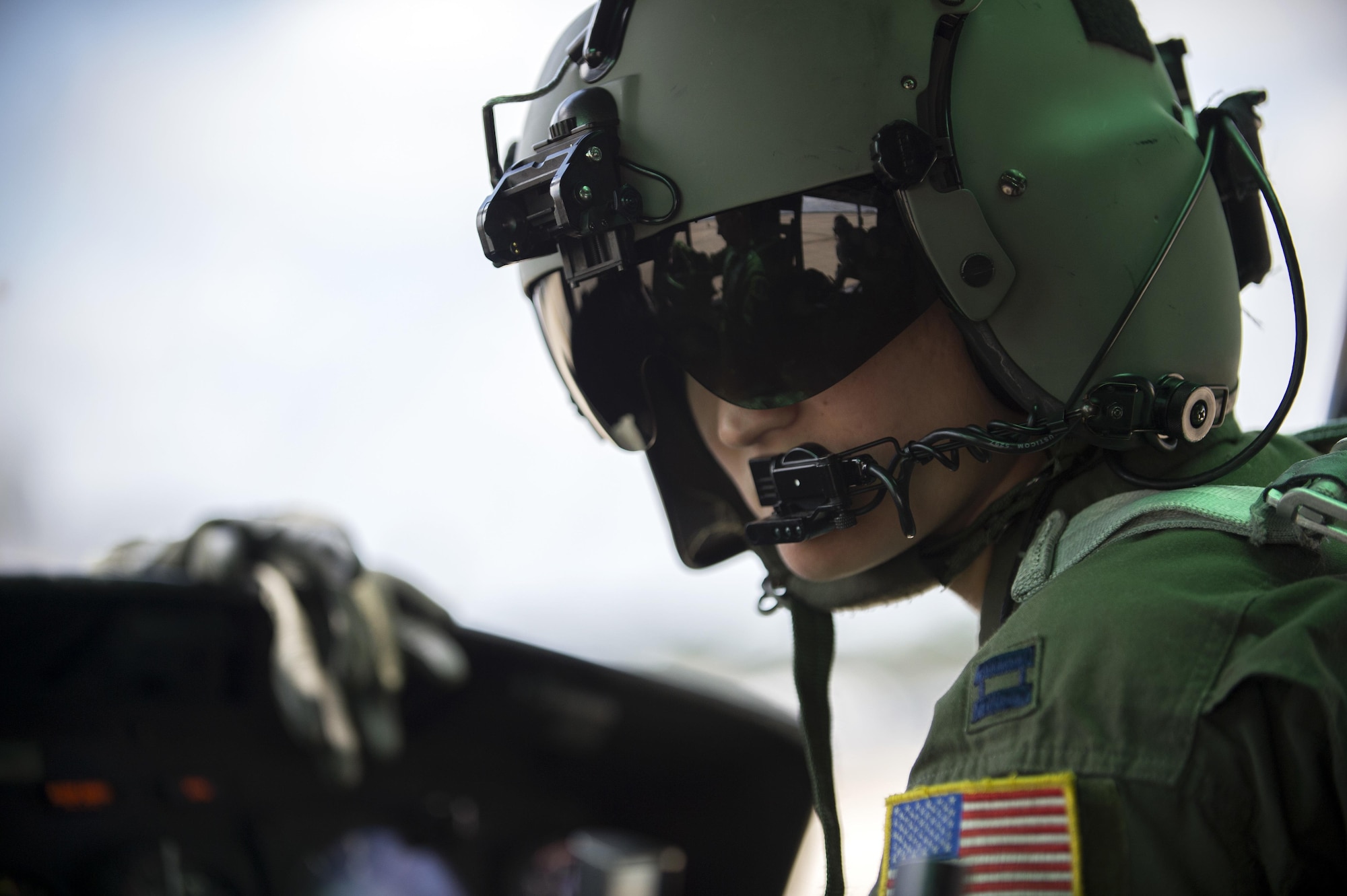 Capt. Brittny Barney, a 1st Helicopter Squadron pilot, performs preflight checks of equipment inside a UH-1N Huey at Joint Base Andrews, Md., Aug. 3, 2016. The 1st HS is the Air Force’s largest helicopter squadron, tracing its heritage back to 1955. (U.S. Air Force photo/Airman 1st Class Philip Bryant)