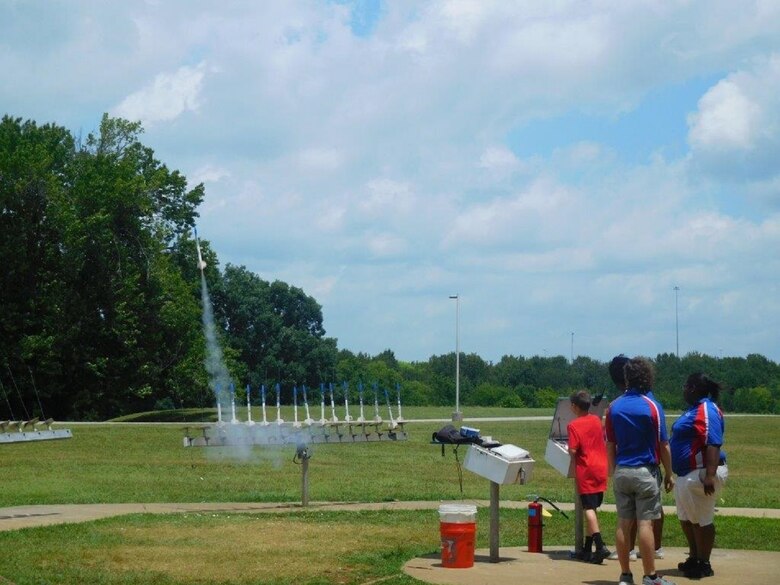 Conner Mullins launches a rocket at Space Camp. 