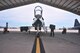U.S. Air Force Maj. Michael Granberry, the 394th Combat Training Squadron T-38 Talon assisted director of operations of the Companion Trainer Program (CTP), adjusts his gear prior to boarding a T-38 Talon aircraft at Whiteman Air Force Base, July 12, 2016. Unsecured gear during in-flight emergencies can lead to complications during egress procedures. 