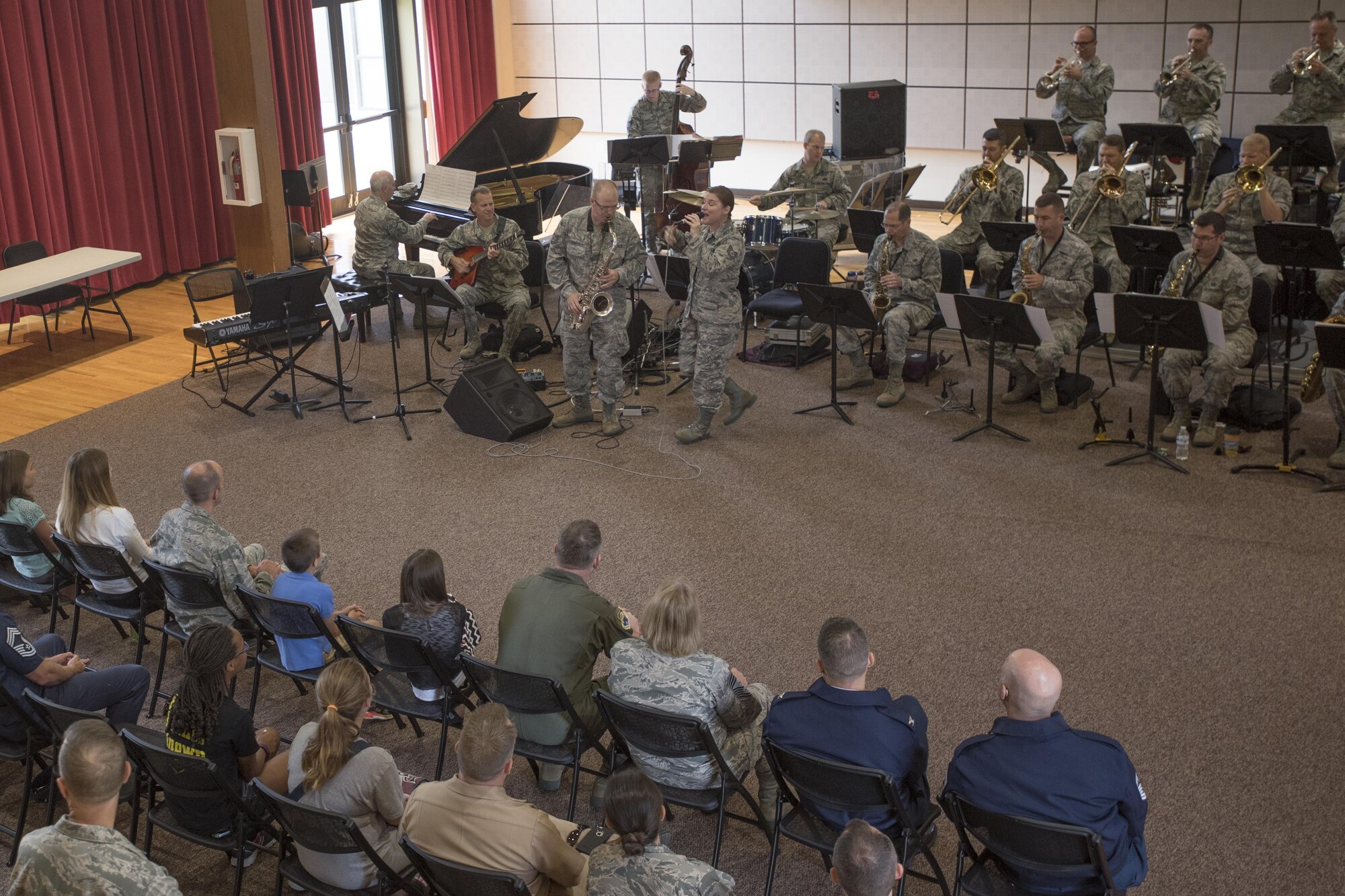 The U.S. Air Force Jazz Band performs during an immersion tour at Joint Base Anacostia-Bolling in Washington, D.C., Aug. 9, 2016. The purpose of the visit was for Col. E. John Teichert, 11th Wing and Joint Base Andrews commander, and Chief Master Sergeant Beth Topa, 11th WG command chief master sergeant, to become more familiar with the U.S. Air Force Band and Honor Guard missions. (U.S. Air Force Photo by Airman 1st Class Rustie Kramer)