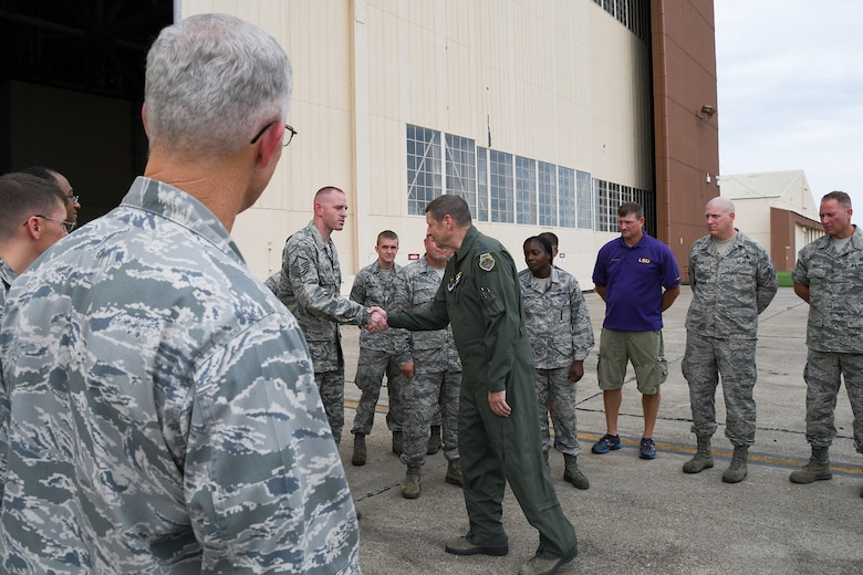 AFGSC Commander Gen. Robin Rand, congratulates Master Sgt. Russell Moyer for being selected as a superior performer in the 307th Maintenance Squadron on August 8, 2016. Rand presented Moyer with a coin and spoke about the importance and continued relevance of the B-52 Stratofortress that the Airmen maintain on Barksdale Air Force Base, La. (U.S. Air Force photo by Master Sgt. Dachelle Melville)