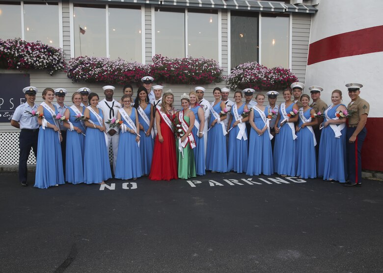 U.S. Navy, Marine and Coast Guard service members pose for a photo as they escort Rockland’s 2016 Maine Sea Princesses to their pageant during Lobster Fest, Aug. 3, 2016. Marines and Sailors with Combat Logistics Battalion 8, 2nd Marine Logistics Group, aboard the USS Oak Hill (LSD-51), were in port to participate in the festival and showcase the expeditionary capabilities of the Navy-Marine Corps team. (U.S. Marine Corps photo by Sgt. Olivia McDonald)