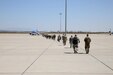 Soldiers with Headquarters and Headquarters Company, 96th Military Police Battalion, U.S. Army Reserve board a flight to Guantanamo Naval Base, Cuba at the Silas L. Copeland Arrival/Departure Airfield Control Group here July 20.