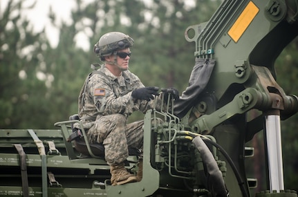 U.S. Army Reserve Sgt. Daniel Caldwell, from the 739th Engineer Company, attached to the 652nd Engineering Company, Hammond, Wis., operates a dry support bridge launch vehicle crane during Combat Support Training Exercise (CSTX) 86-16-03 at Fort McCoy, Wis., August 11, 2016. The 84th Training Command’s third and final Combat Support Training Exercise of the year hosted by the 86th Training Division at Fort McCoy, Wis. is a multi-component and joint endeavor aligned with other reserve component exercises. (U.S. Army photo by Spc. Cody Hein/Released)