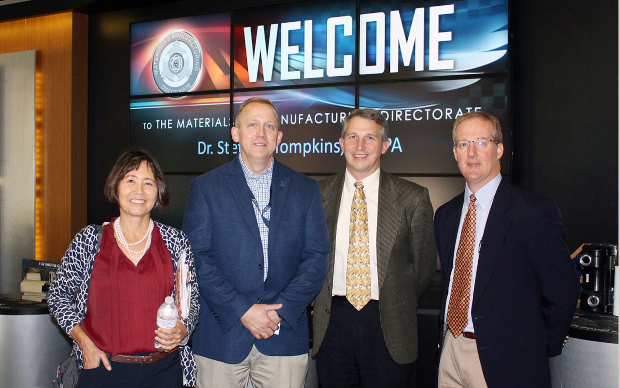 Dr. Stephanie Tompkins, Director, Defense Sciences Office, Defense Advanced Research Projects Agency, visited the Materials and Manufacturing Directorate, Air Force Research Laboratory, Aug. 11 to view some of the on-going research throughout AFRL. Tompkins was briefed on current research trends and activity in Nano tomography, materials characterization, additive manufacturing and the benefits of real-time analytics in development of technology for today’s warfighter. As the director of DSO, Tompkins maintains a strong interest in cutting-edge research that can accelerate the development of new technologies for national security. Pictured L-R: Dr. Stephanie Tompkins; Dr. Morley Stone, AFRL Chief Technology Officer; Dr. Richard Vaia, Technology Director, Functional Materials Division; and Dr. Stephan Russ, Technical Director, Structural Materials Division. (U.S. Air Force Photo / Marisa Novobilski)