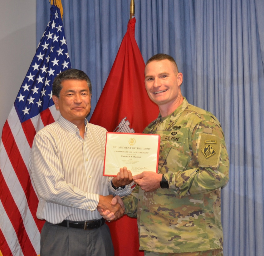 ALBUQUERQUE, N.M. – Lt. Col. James Booth recognizes Tom Bueno as the District’s employee of the third quarter, FY2016, Aug. 1, 2016.  A program manager in the District’s Military and IIS Section, Bueno has successfully led some of the District’s most challenging Project Delivery Teams over the last quarter. “He has responsibility for most of the District's highest priority projects. His professional, calm, level-headed method of doing business has helped immensely during very challenging changes and schedule issues for these in-house and AE-designed projects. The District's customers are very pleased with his abilities and skill in overcoming the obstacles presented in these complex projects.”    

