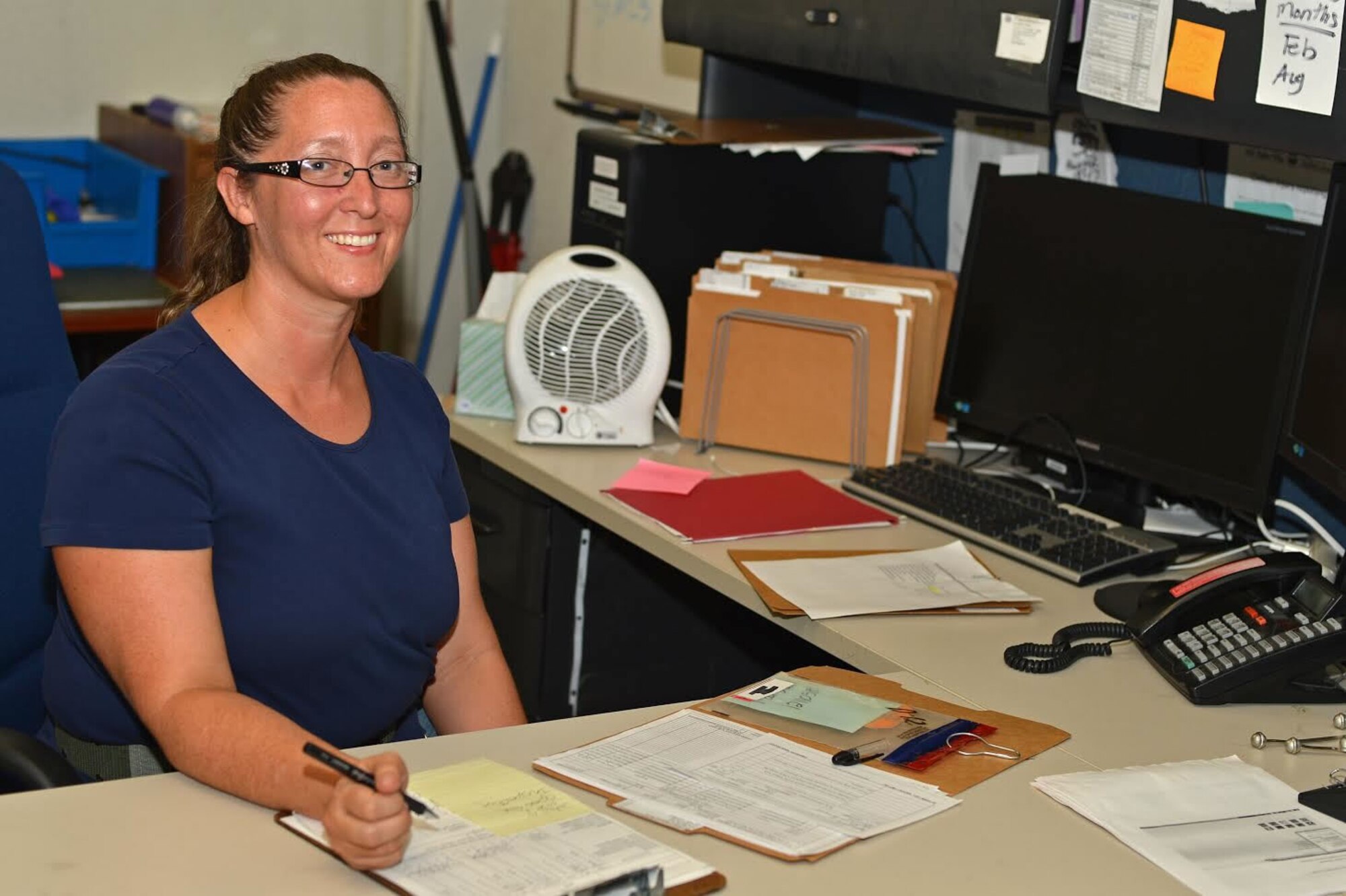 Laura Jones, 20th Logistics Readiness Squadron logistics readiness technician, poses for a photo at Shaw Air Force Base, S.C., Aug. 5, 2016. Jones is in charge of supplying Team Shaw members with the proper equipment, such as M4 carbines, M9 pistols and various individual protective equipment before they deploy. (U.S. Air Force photo by Airman 1st Class Christopher Maldonado)