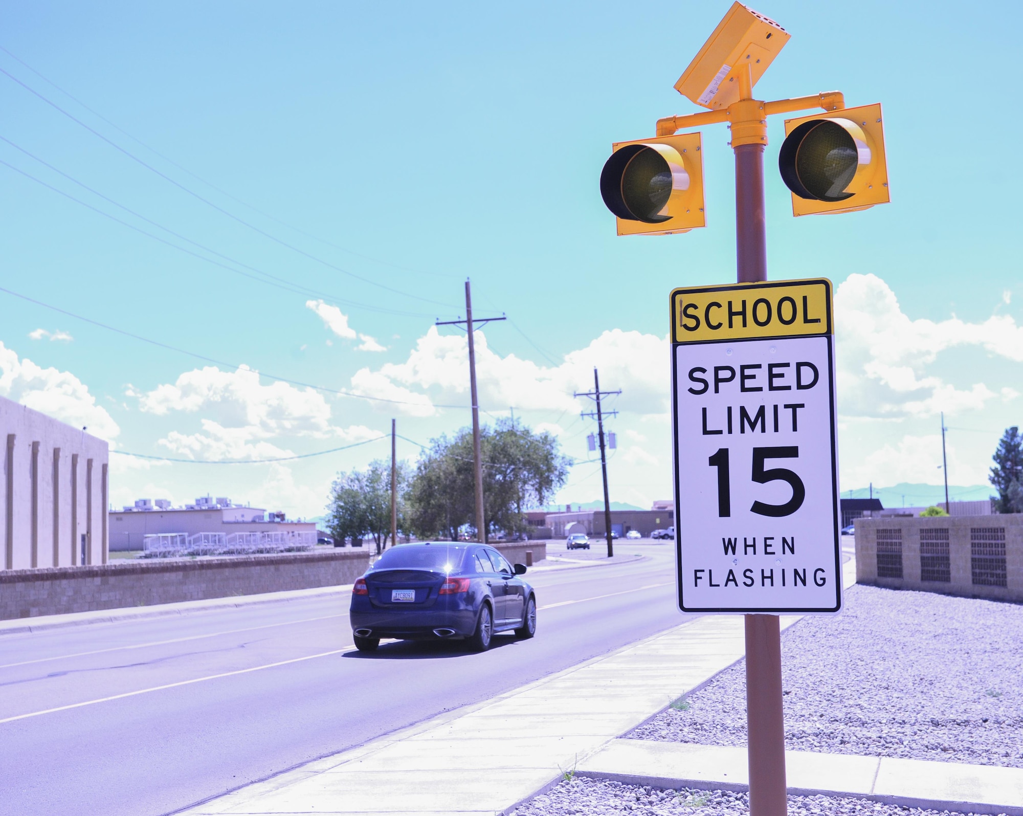 Beginning Aug. 8, Holloman's school speed zones will be in effect from 7:45-8:15 a.m. and 2:35-3:05 p.m. Monday through Friday. Security forces will be strictly enforcing driving standards in school zones to help prevent accidents and ensure child safety. Motorists cited by security forces may temporarily lose on-base driving privileges. (U.S. Air Force photo by Tech. Sgt. Matthew Rosine) 
