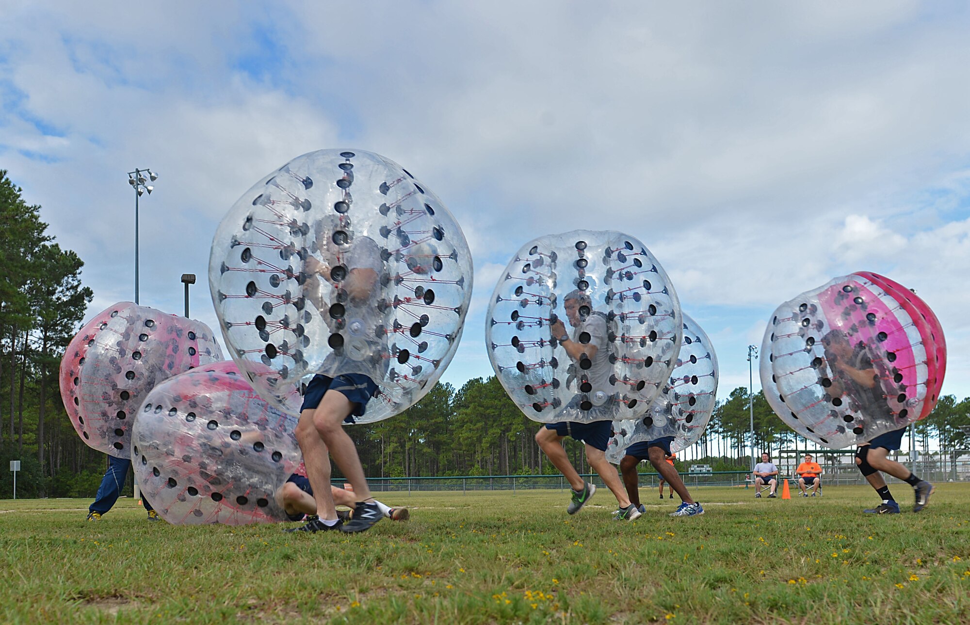 U.S. Airmen assigned to the 20th Fighter Wing play knockerball during a Comprehensive Airman Fitness sports day at Shaw Air Force Base, S.C., Aug. 10, 2016. Airmen competed in teams of five to score points, as well as strengthen relationships with other members of the 20th FW. (U.S. Air Force photo by Airman 1st Class Christopher Maldonado)