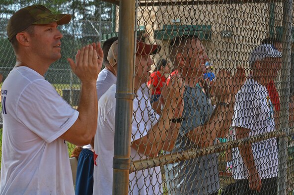 U.S. Airmen assigned to the 20th Fighter Wing cheer after a teammate scores a homerun during a Comprehensive Airman Fitness and sports day at Shaw Air Force Base, S.C., Aug. 10, 2016. The event gave Team Shaw the opportunity to build comradery and recover from the UEI a week prior. (U.S. Air Force photo by Airman 1st Class Christopher Maldonado)