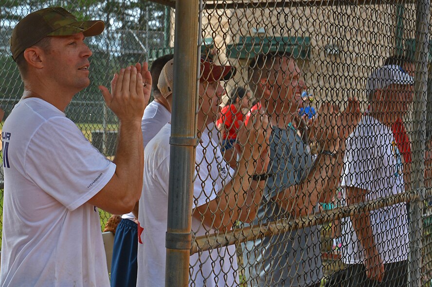 U.S. Airmen assigned to the 20th Fighter Wing cheer after a teammate scores a homerun during a Comprehensive Airman Fitness and sports day at Shaw Air Force Base, S.C., Aug. 10, 2016. The event gave Team Shaw the opportunity to build comradery and recover from the UEI a week prior. (U.S. Air Force photo by Airman 1st Class Christopher Maldonado)