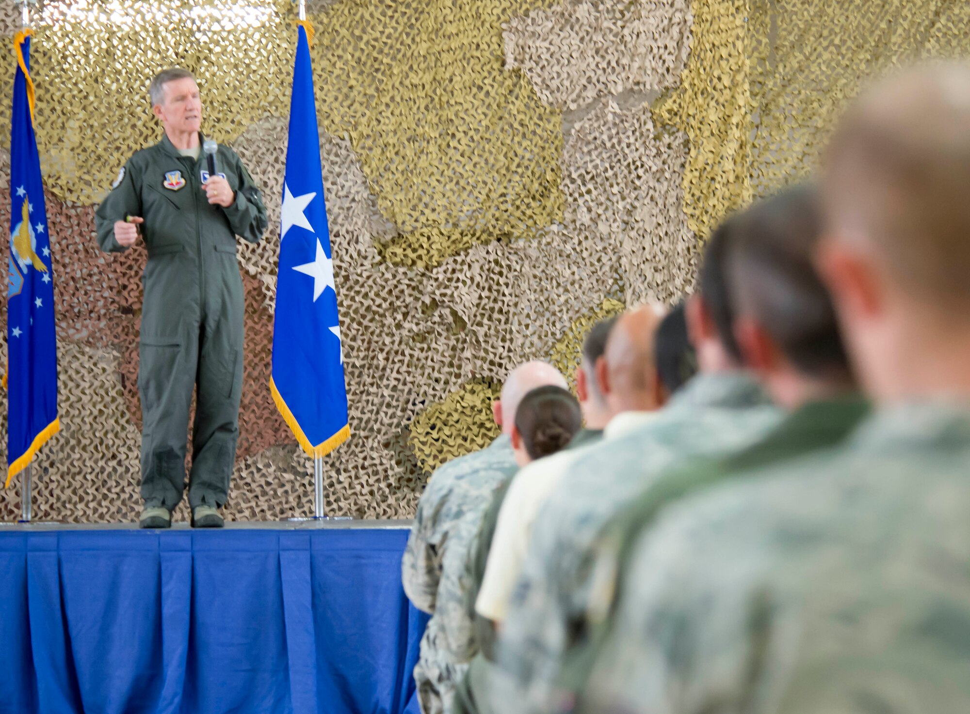 Gen. Hawk Carlisle, the commander of Air Combat Command, answers questions during an all-call Aug. 8, 2016, at Holloman Air Force Base, N.M. The discussions focused on upcoming changes at Holloman AFB and how those changes would affect the mission at the base. (U.S. Air Force photo by Airman 1st Class Randahl J. Jenson)