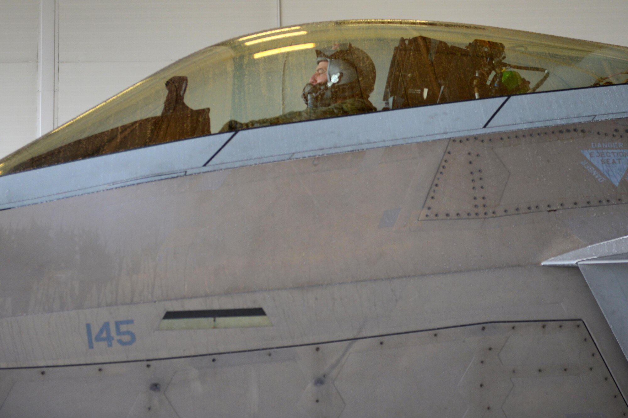 Air Force Lt. Gen. Russell Handy arrives at a 525th Fighter Squadron hangar after his final flight as Alaskan Command, Alaskan North American Aerospace Defense Region and 11th Air Force commander, at Joint Base Elmendorf-Richardson, Alaska, Aug. 10, 2016. Handy is a command pilot with more than 3,600 flight hours, primarily in the F-15 Eagle and F-22A Raptor. He has participated in numerous combat operations and deployments, including operations Desert Shield, Desert Storm, Desert Fox, Southern Watch, Noble Eagle, Iraqi Freedom and New Dawn. (U.S. Air Force photo by Airman 1st Class Javier Alvarez)