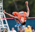 David "D.J." Smith Sanchez makes sure he clears the bar while competing as a member of the Auburn University track team. He is competing as a member of the Puerto Rican National Olympic Team at this summer’s Olympic games in Rio de Janeiro in honor of his maternal grandfather who born in Puerto Rico and passed away two years ago. His dad, David Smith, is a customer support technician at DLA Aviation at Warner Robins, Georgia. 