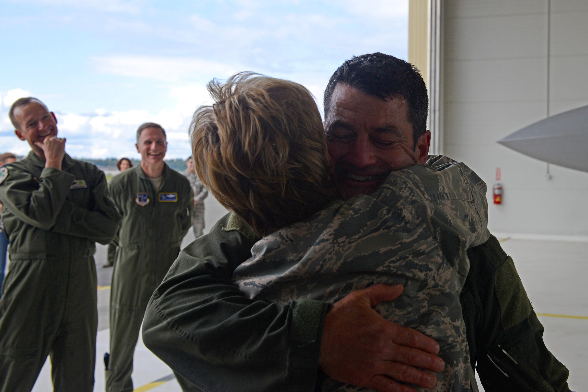 Air Force Lt. Gen. Russell Handy is greeted by friends and family after his final flight as Alaskan Command, Alaskan North American Aerospace Defense Region and 11th Air Force commander at Joint Base Elmendorf-Richardson, Alaska, Aug. 10, 2016. Handy is a command pilot with more than 3,600 flight hours, primarily in the F-15 Eagle and F-22A Raptor. He has participated in numerous combat operations and deployments, including operations Desert Shield, Desert Storm, Desert Fox, Southern Watch, Noble Eagle, Iraqi Freedom and New Dawn. (U.S. Air Force photo by Airman 1st Class Javier Alvarez)