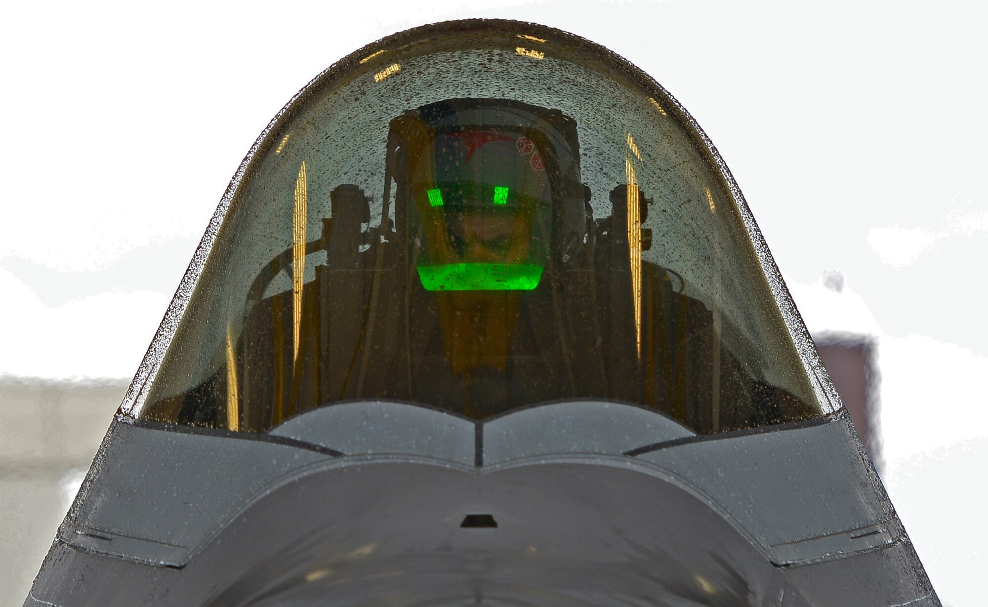 Air Force Lt. Gen. Russell Handy prepares to exit an F-22 Raptor after his final flight as Alaskan Command, Alaskan North American Aerospace Defense Region and 11th Air Force commander, at Joint Base Elmendorf-Richardson, Alaska, Aug. 10, 2016. Handy is a command pilot with more than 3,600 flight hours, primarily in the F-15 Eagle and F-22A Raptor. He has participated in numerous combat operations and deployments, including operations Desert Shield, Desert Storm, Desert Fox, Southern Watch, Noble Eagle, Iraqi Freedom and New Dawn. (U.S. Air Force photo by Airman 1st Class Javier Alvarez)