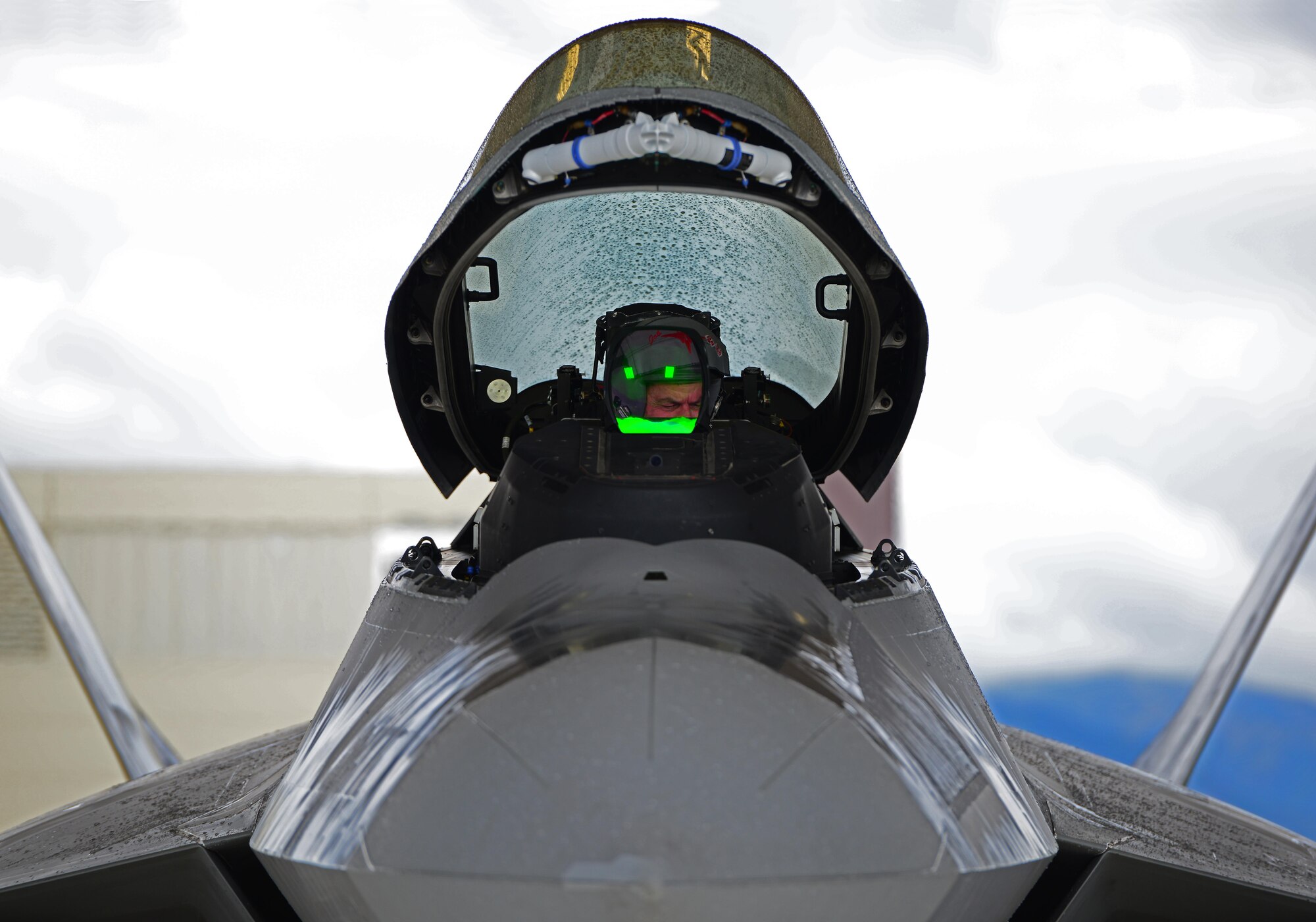 Air Force Lt. Gen. Russell Handy prepares to exit an F-22 Raptor after his final flight as Alaskan Command, Alaskan North American Aerospace Defense Region and 11th Air Force commander, at Joint Base Elmendorf-Richardson, Alaska, Aug. 10, 2016. Handy is the senior military officer in Alaska, responsible for the integration of all military activities in the Alaska joint operations area, synchronizing the activities of more than 21,000 active-duty and Reserve forces from all services. (U.S. Air Force photo by Airman 1st Class Javier Alvarez)