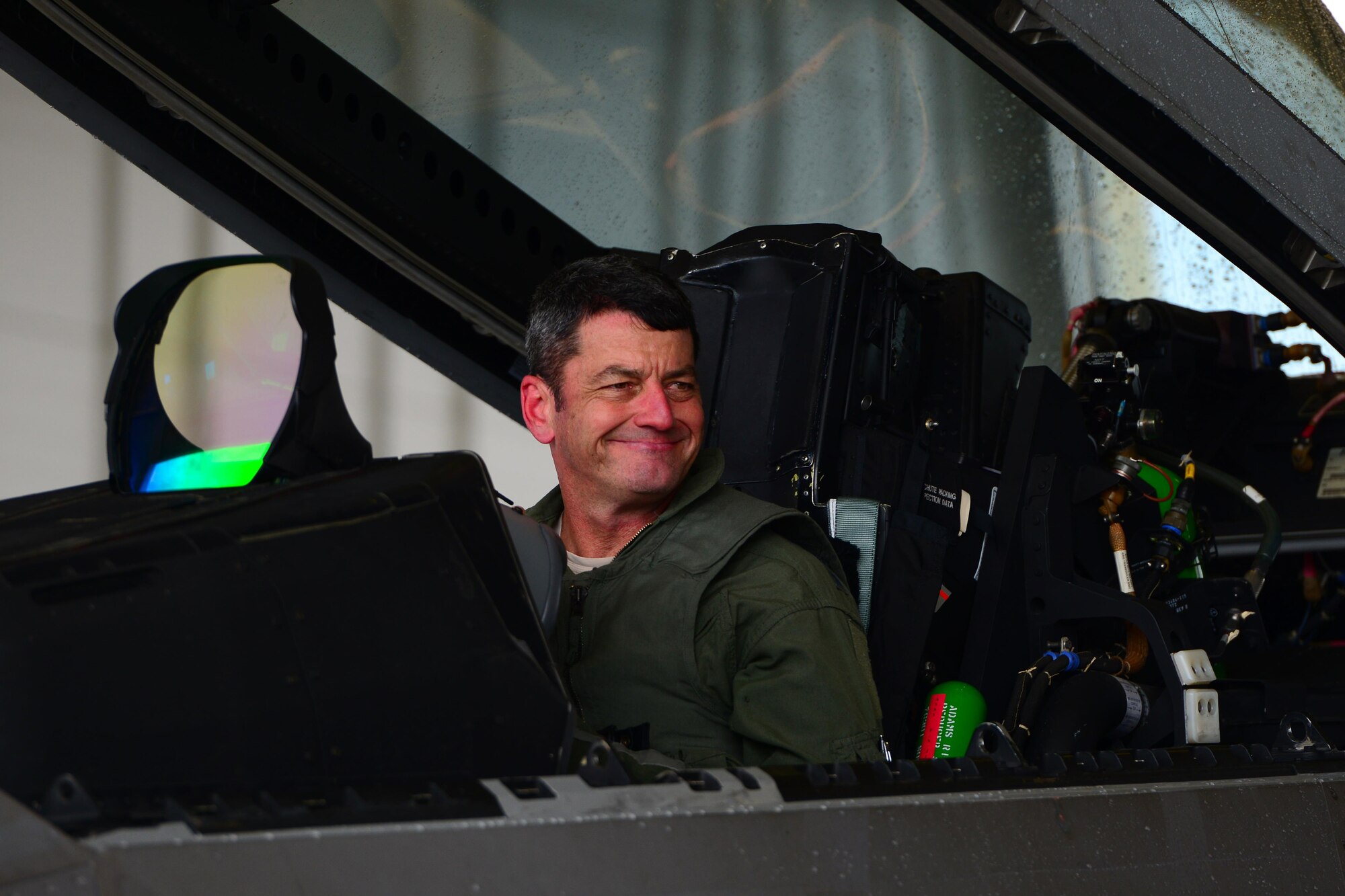 Air Force Lt. Gen. Russell Handy greets friends and family from the cockpit of an F-22 Raptor after his final flight as Alaskan Command, Alaskan North American Aerospace Defense Region and 11th Air Force commander, at Joint Base Elmendorf-Richardson, Alaska, Aug. 10, 2016. Handy is a command pilot with more than 3,600 flight hours, primarily in the F-15 Eagle and F-22A Raptor. He has participated in numerous combat operations and deployments, including operations Desert Shield, Desert Storm, Desert Fox, Southern Watch, Noble Eagle, Iraqi Freedom and New Dawn. (U.S. Air Force photo by Airman 1st Class Javier Alvarez)