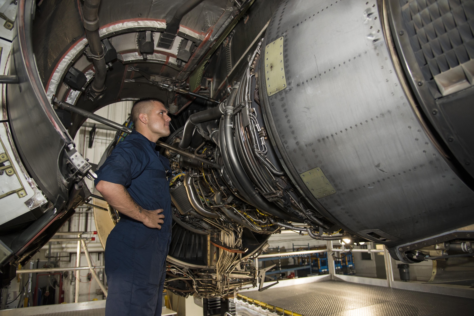Senior Airman Austin Toniolo, 736th Aircraft Maintenance Squadron crew chief, inspects an engine on a C-17A Globemaster III while standing on a C-17 Engine Maintenance Platform on Aug. 1, 2016, at Dover Air Force Base, Del. Each aircraft is inspected every 120 days in planned routine inspections called home station checks. (U.S. Air Force photo by Senior Airman Aaron J. Jenne)