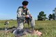 Staff Sgt. Thomas Burton, 11th Security Forces Group response force leader, assists Staff Sgt. Tim Cobbel, 11th Wing paralegal, who acts as an aircraft crash victim for the Major Accident Response Exercise at Joint Base Andrews, Md., Aug. 11, 2016. The MARE is an annual training requirement for a base to test its readiness and response capabilities. (U.S. Air Force photo by Senior Airman Joshua R. M. Dewberry)